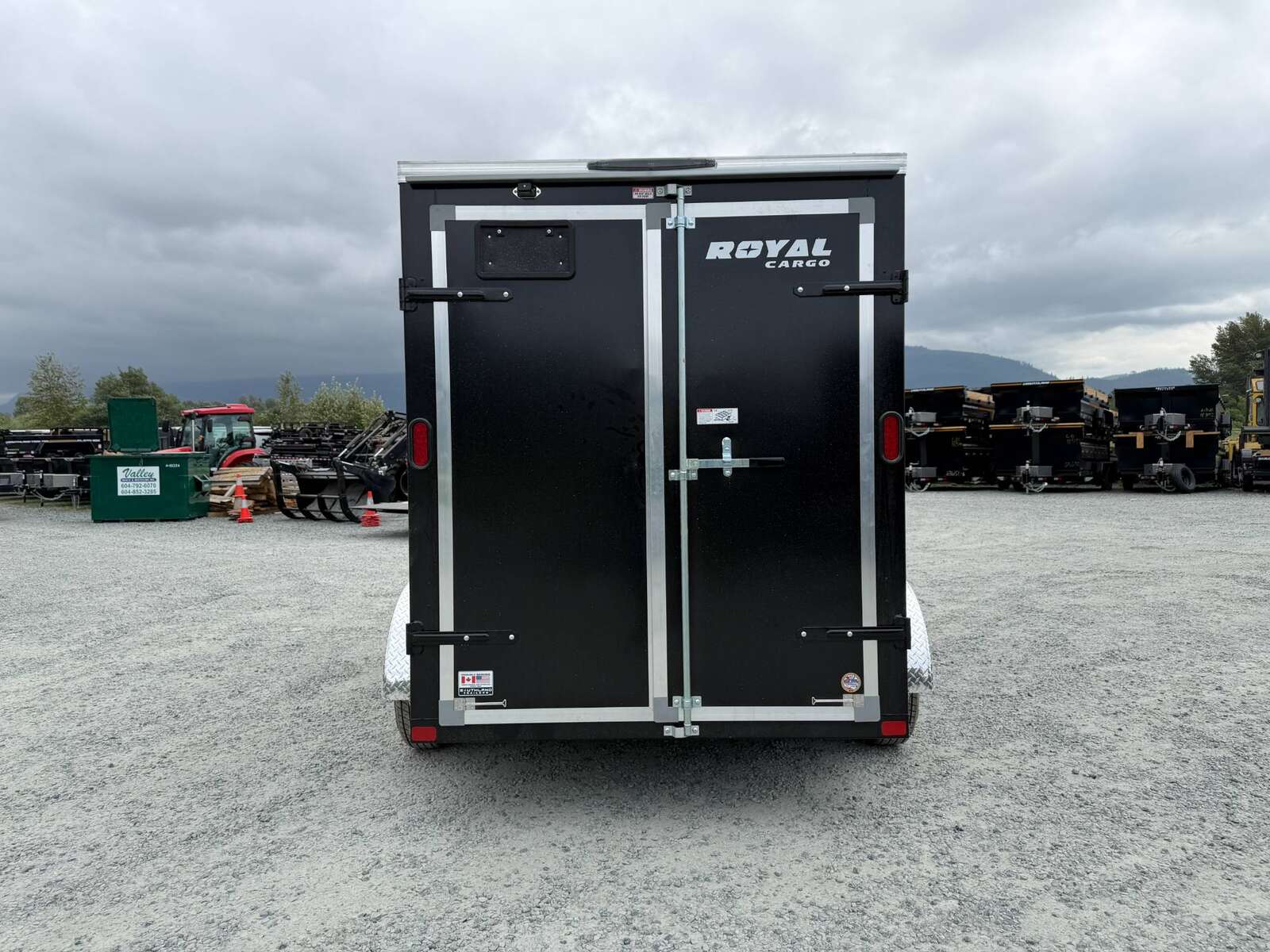 Photo of 2026 Royal Cargo 6x12 Enclosed Trailer Tandem Axle Rear Barn Doors Black 7700lbs GVW