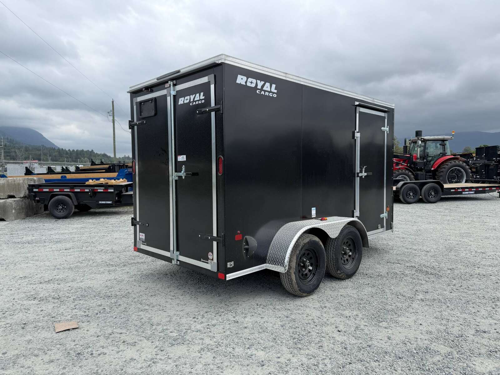 Photo of 2026 Royal Cargo 6x12 Enclosed Trailer Tandem Axle Rear Barn Doors Black 7700lbs GVW