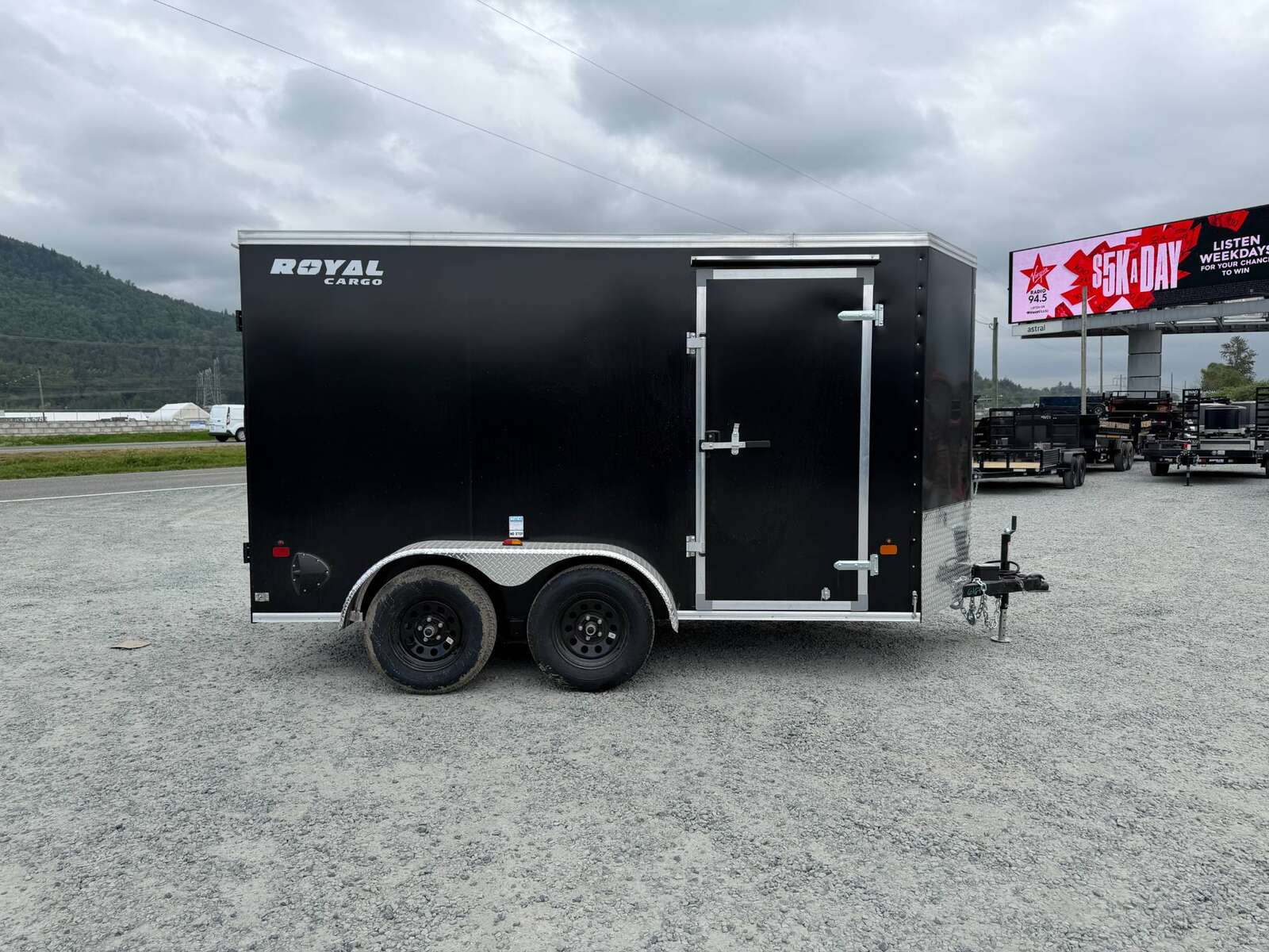 Photo of 2026 Royal Cargo 6x12 Enclosed Trailer Tandem Axle Rear Barn Doors Black 7700lbs GVW