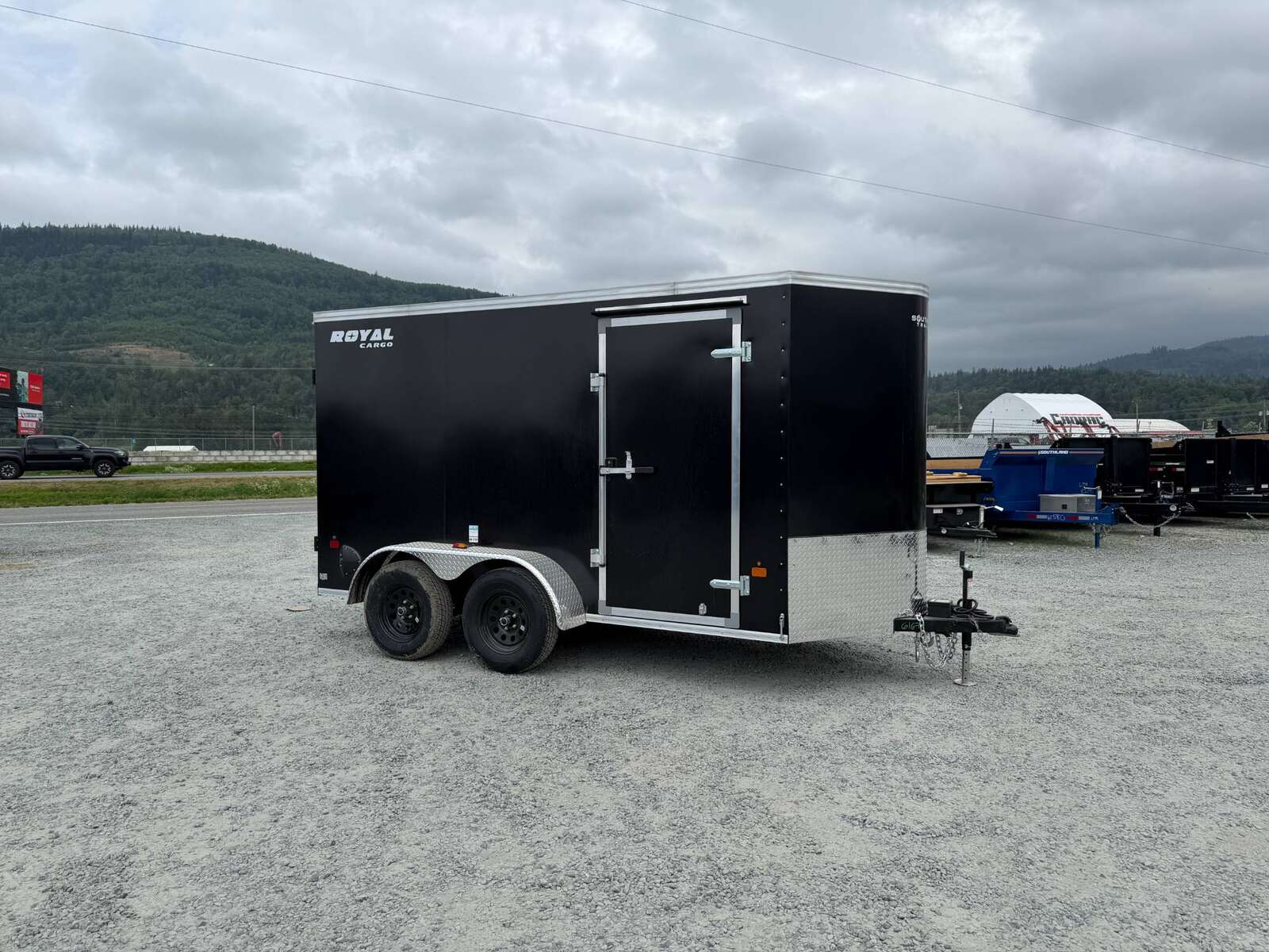 Photo of 2026 Royal Cargo 6x12 Enclosed Trailer Tandem Axle Rear Barn Doors Black 7700lbs GVW