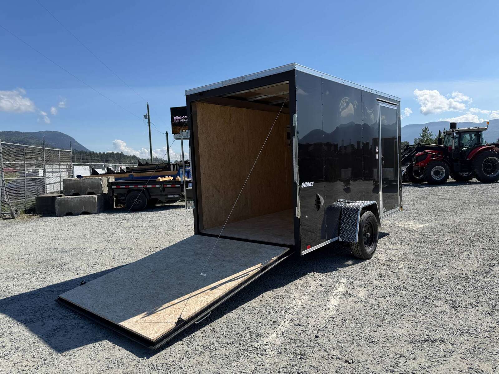 Photo of 2026 Impact Quake 6x12 V Nose Cargo / Enclosed Trailer Black Ramp Door Extra Height 2990lb GVW