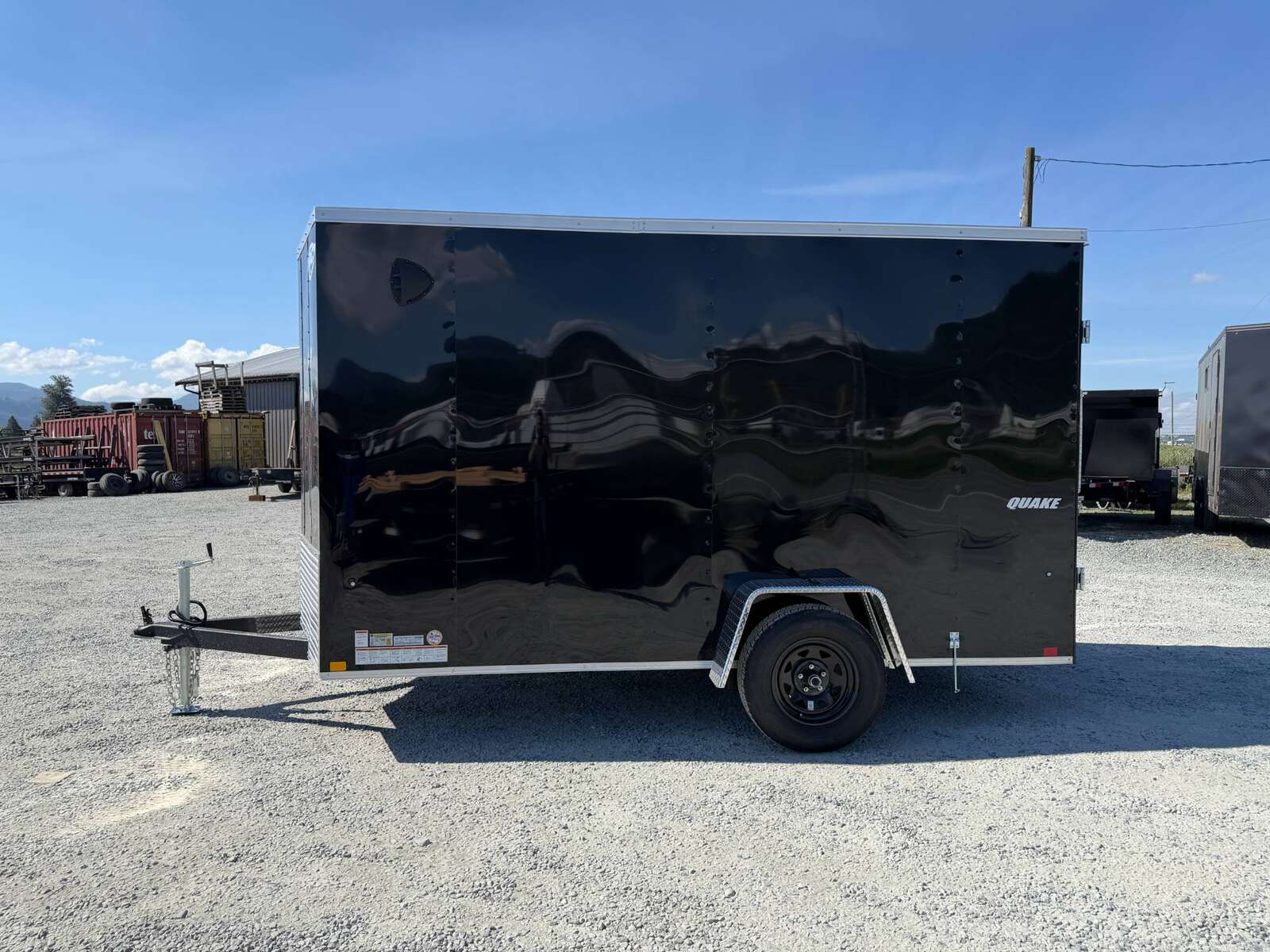 Photo of 2026 Impact Quake 6x12 V Nose Cargo / Enclosed Trailer Black Barn Doors Extra Height 2990lb GVW