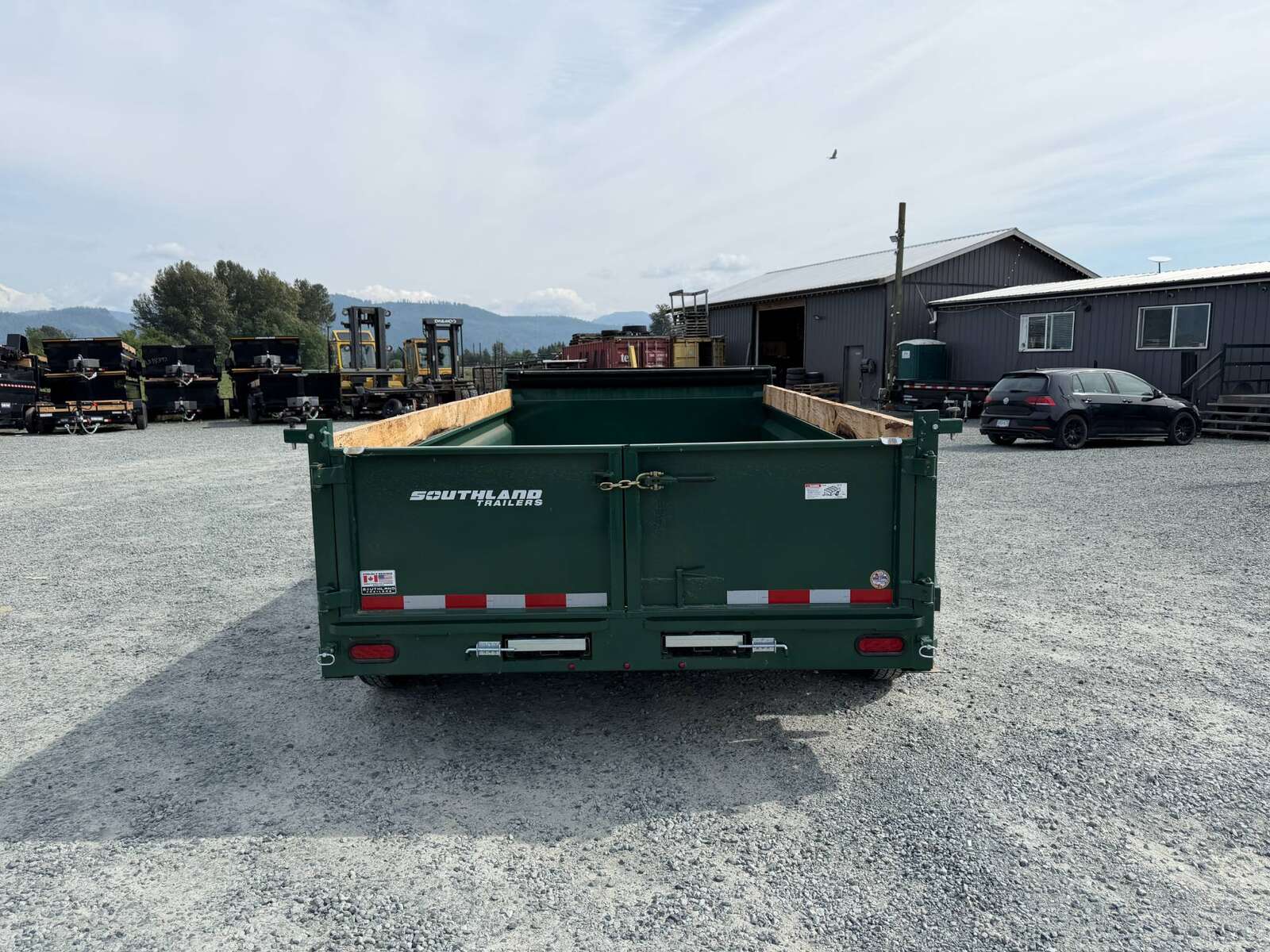 Photo of 2026 Southland 7x14 Dump Trailer GREEN 15,400lbs GVW with Tarp And Ramps (SL714-14K)