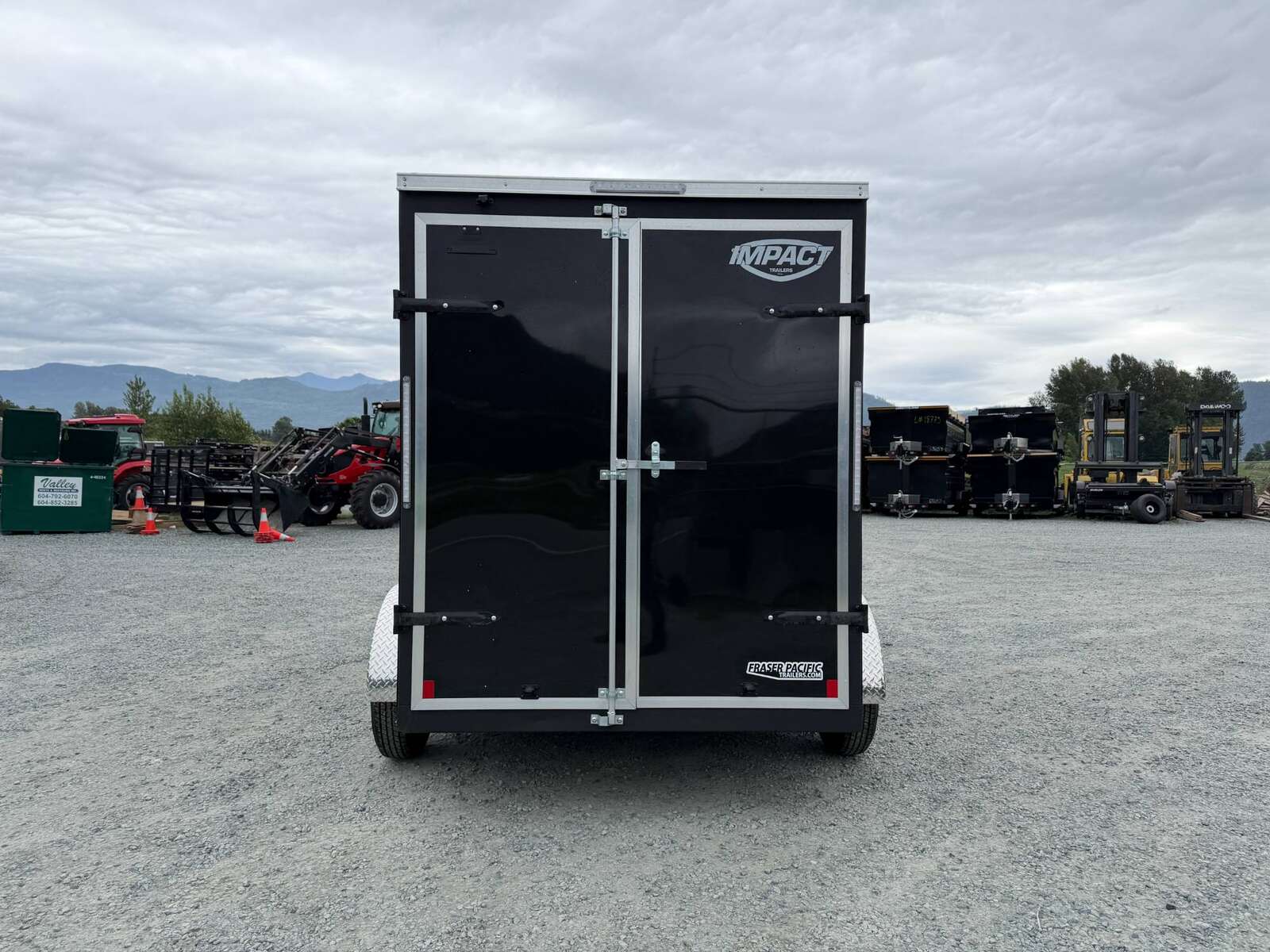 Photo of 2026 Impact Quake 6x12 V Nose Cargo / Enclosed Trailer Tandem Axle Black Barn Doors Extra Height 7000lb GVW