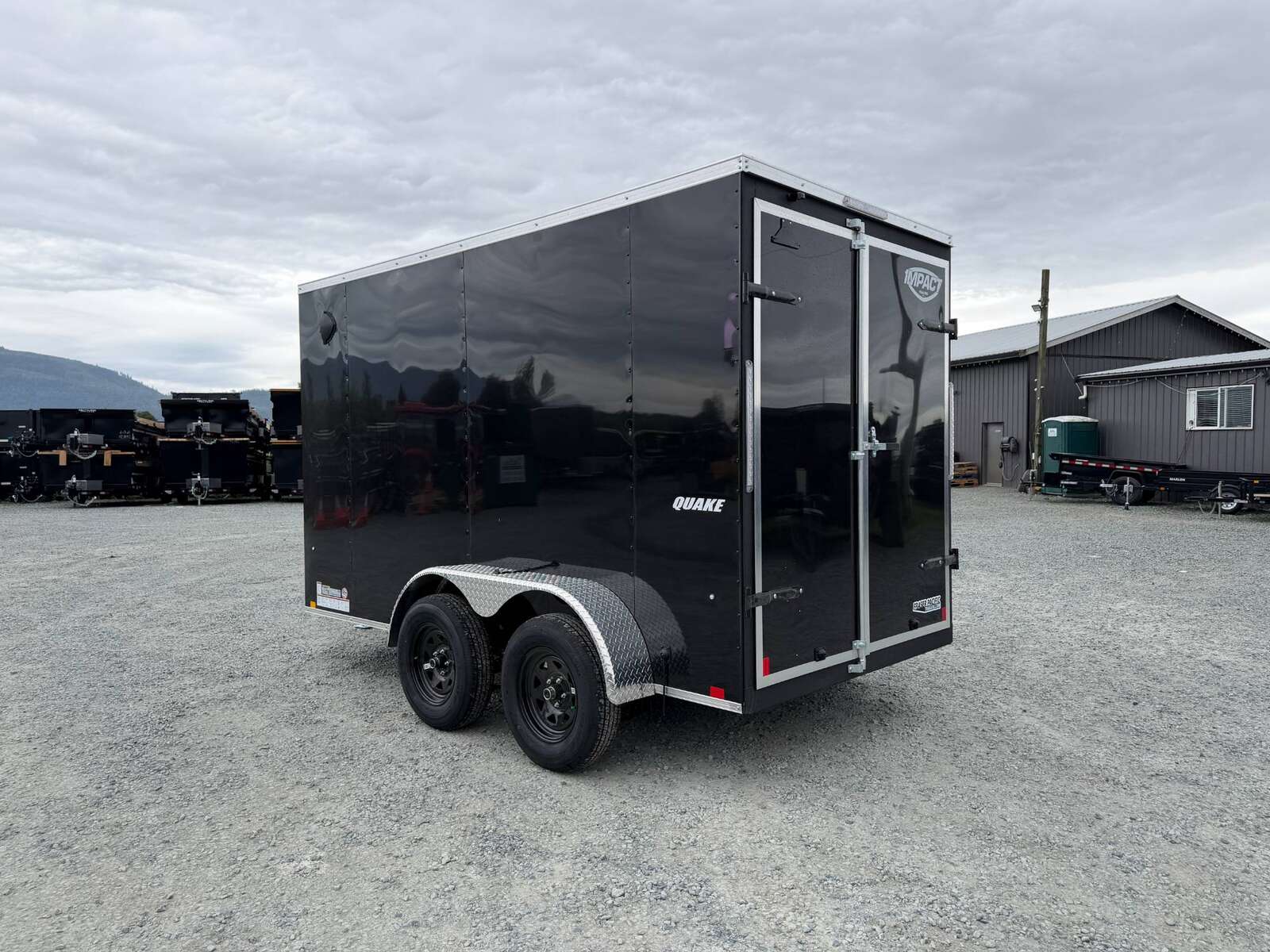 Photo of 2026 Impact Quake 6x12 V Nose Cargo / Enclosed Trailer Tandem Axle Black Barn Doors Extra Height 7000lb GVW