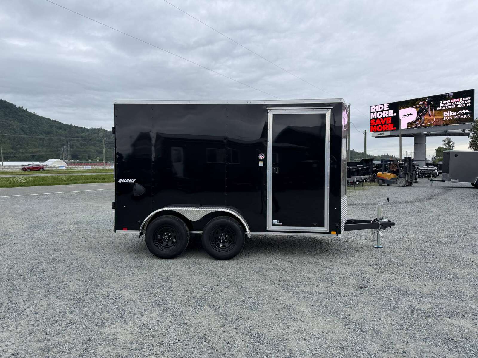 Photo of 2026 Impact Quake 6x12 V Nose Cargo / Enclosed Trailer Tandem Axle Black Barn Doors Extra Height 7000lb GVW