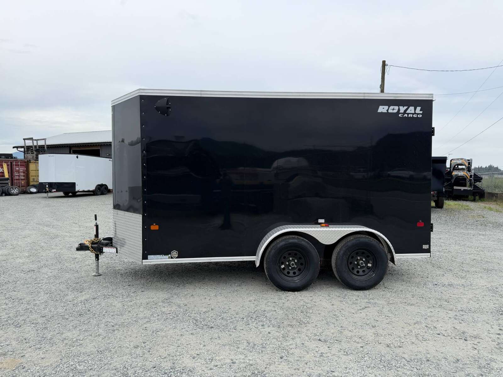 Photo of 2026 Royal Cargo 6x12 Enclosed Trailer Tandem Axle Rear Barn Doors Gloss Black 7700lbs GVW