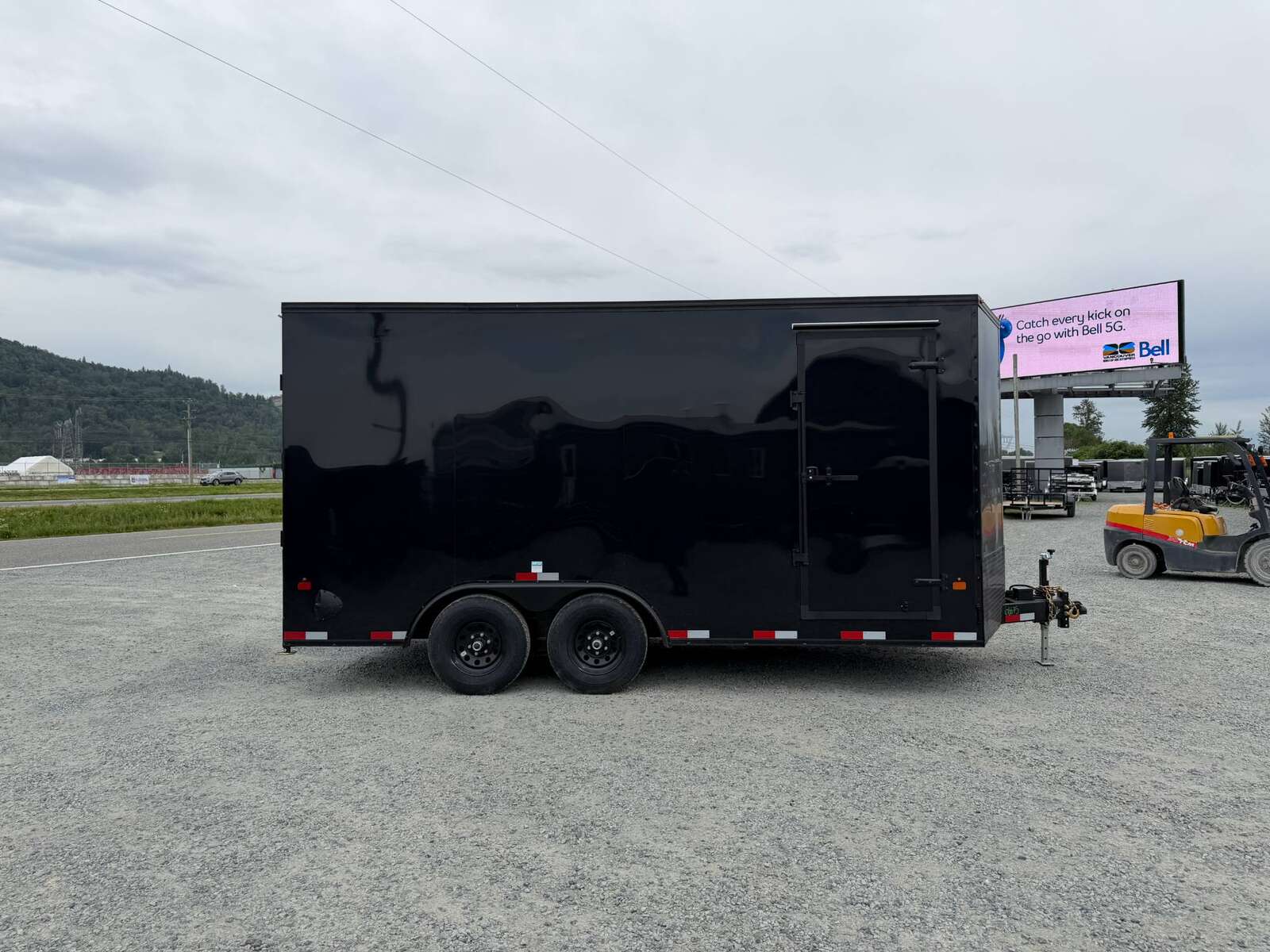 Photo of 2026 Royal Cargo 8.5X16 V NOSE Cargo / Enclosed Trailer GLOSS BLACK w/ BLACKOUT PKG RAMP DOOR EXTRA HEIGHT 11,400LB GVW (GSR)