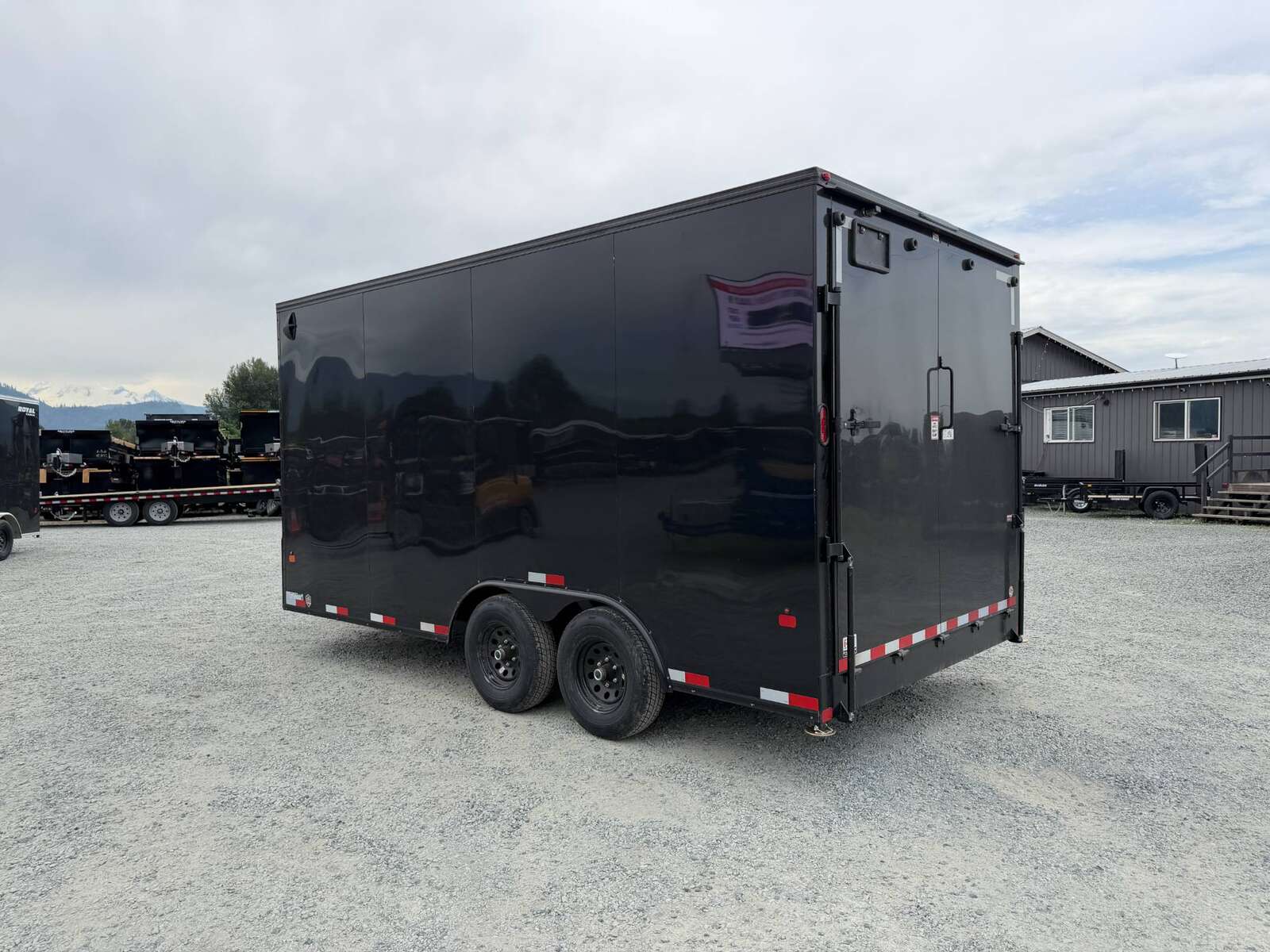 Photo of 2026 Royal Cargo 8.5X16 V NOSE Cargo / Enclosed Trailer GLOSS BLACK w/ BLACKOUT PKG RAMP DOOR EXTRA HEIGHT 11,400LB GVW (GSR)