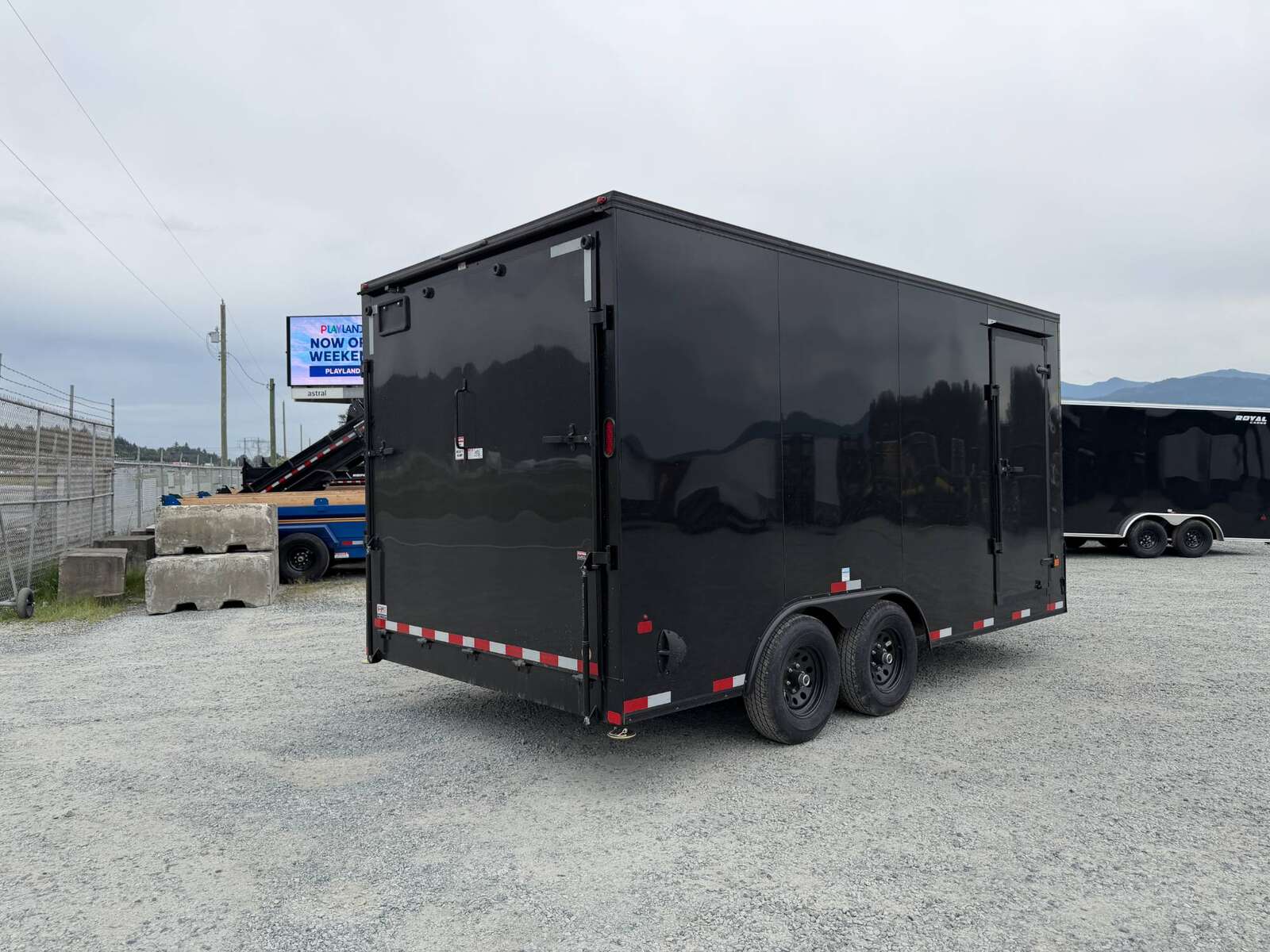 Photo of 2026 Royal Cargo 8.5X16 V NOSE Cargo / Enclosed Trailer GLOSS BLACK w/ BLACKOUT PKG RAMP DOOR EXTRA HEIGHT 11,400LB GVW (GSR)