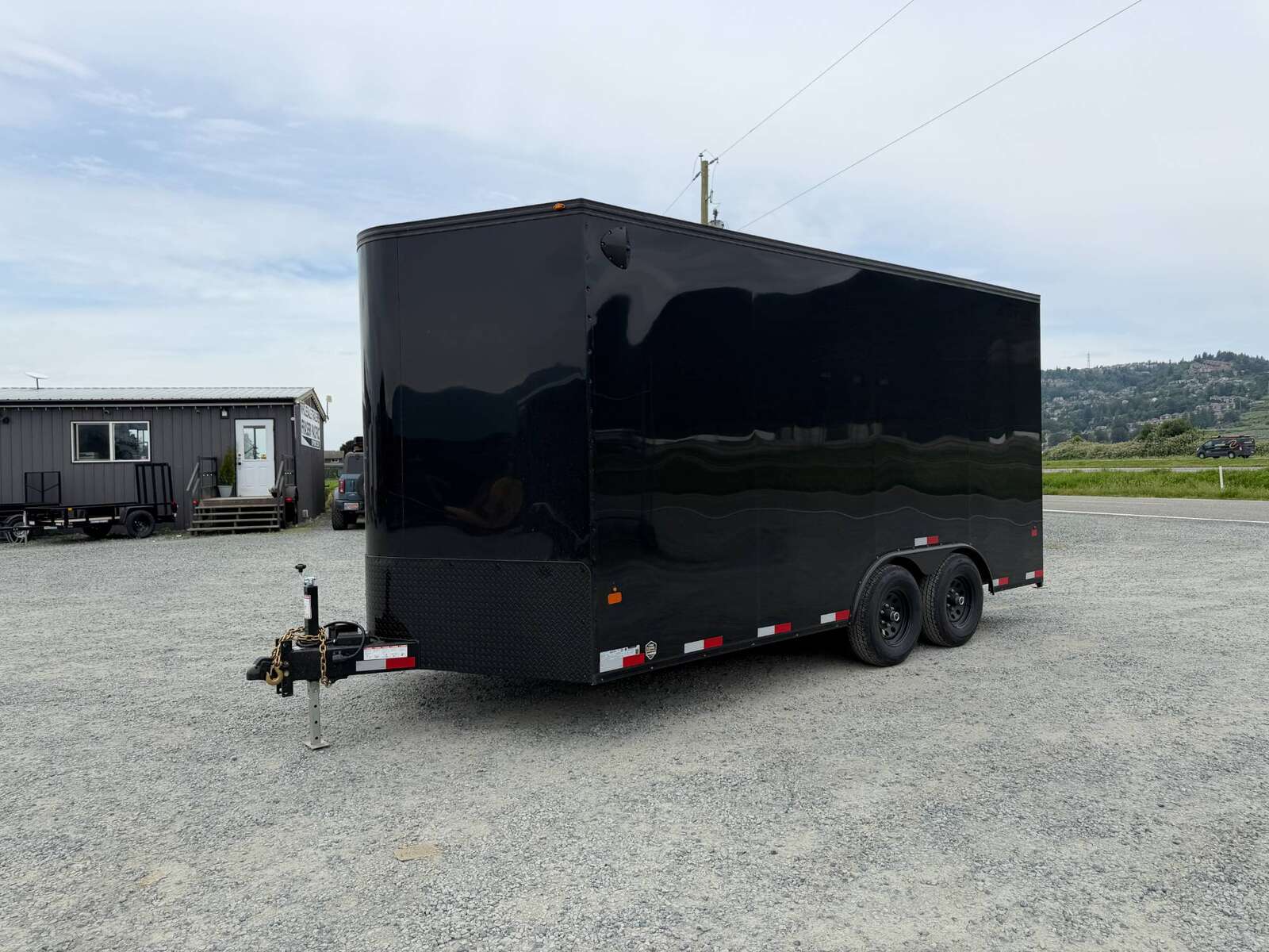 Photo of 2026 Royal Cargo 8.5X16 V NOSE Cargo / Enclosed Trailer GLOSS BLACK w/ BLACKOUT PKG RAMP DOOR EXTRA HEIGHT 11,400LB GVW (GSR)