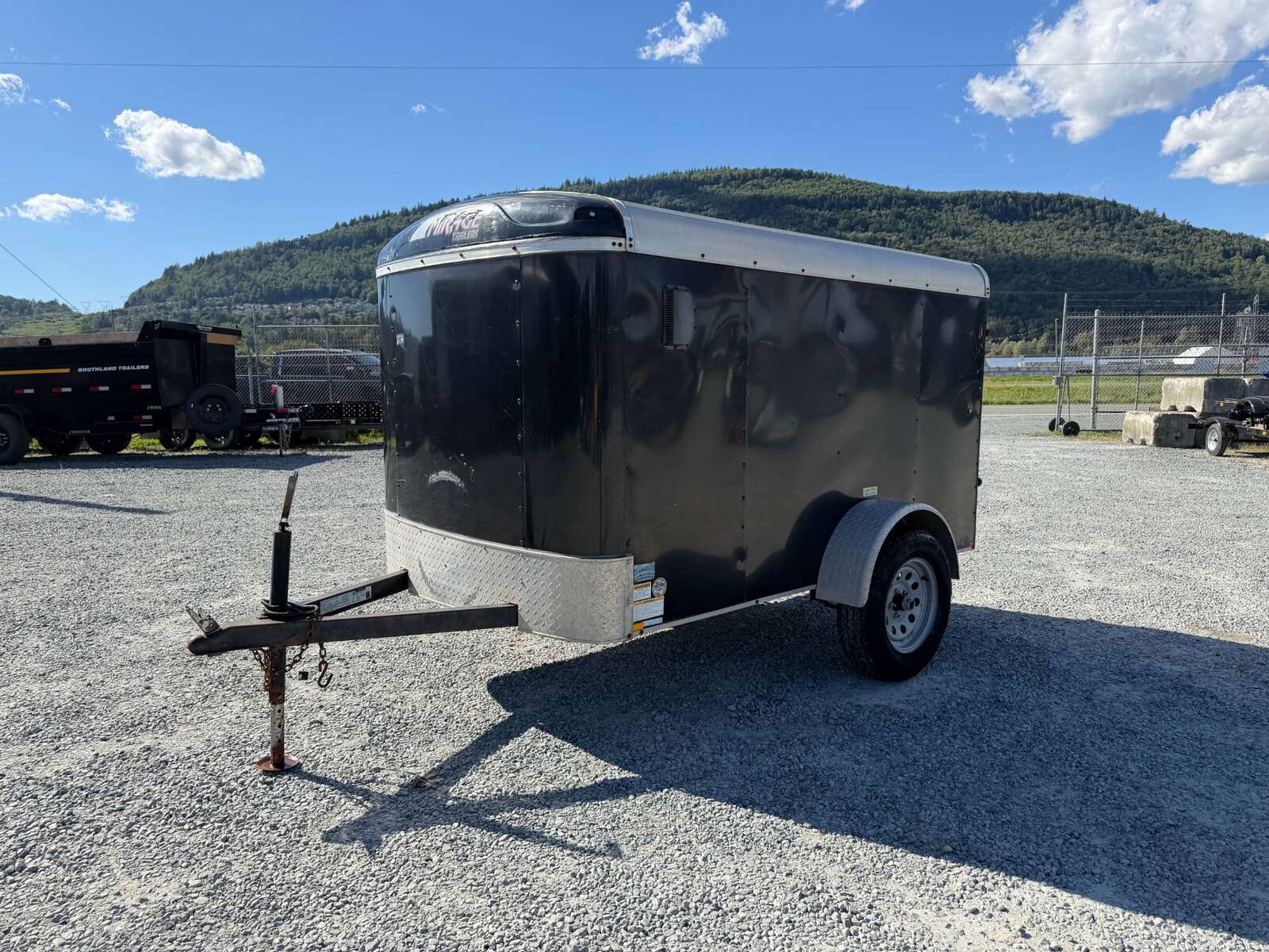 Photo of Pre Owned Used 2017 Mirage 5x8 Cargo / Enclosed Trailer Black Ramp Door 2990lb GVW