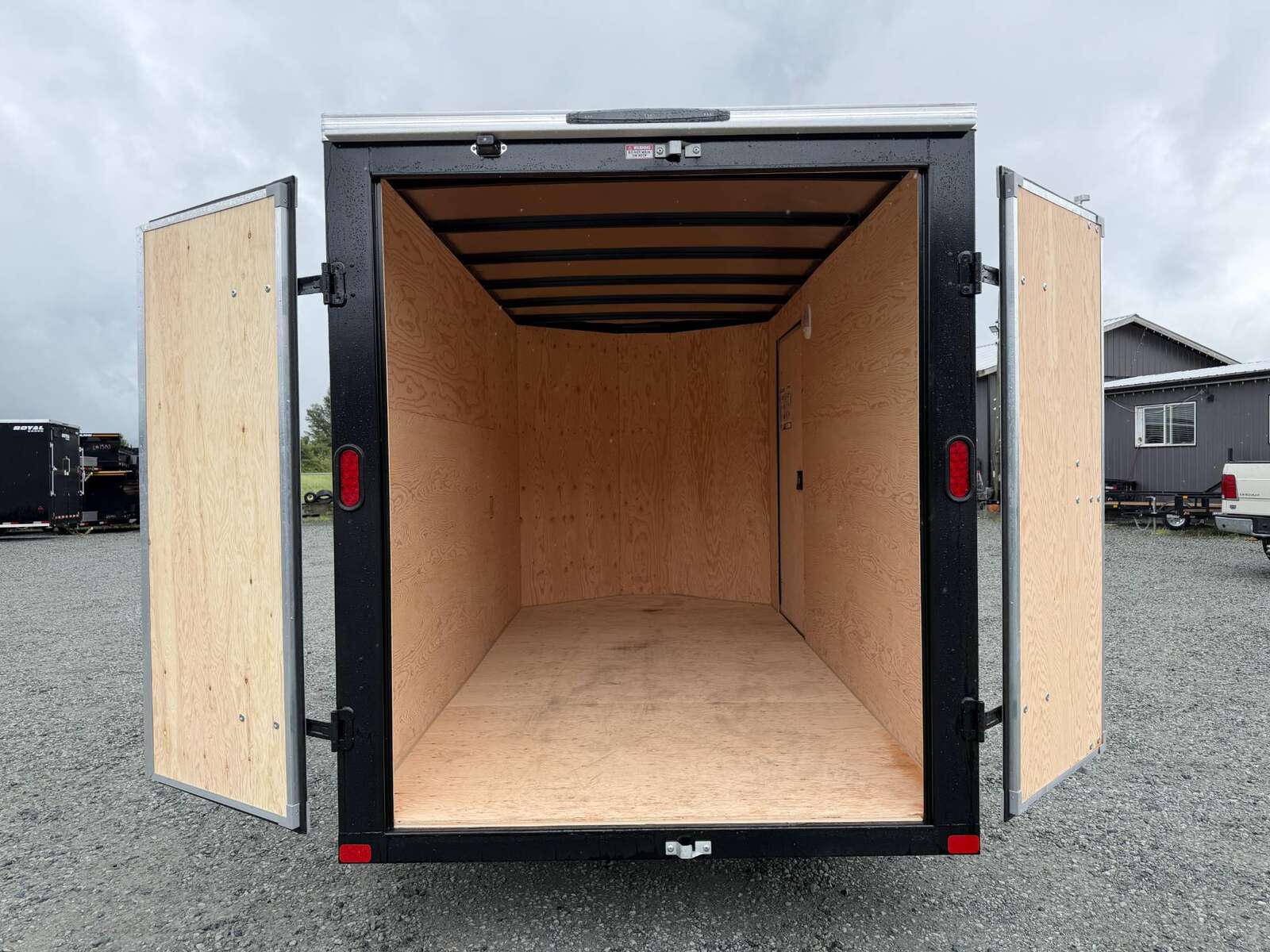 Photo of 2026 Royal Cargo 6x12 V Nose Cargo / Enclosed Trailer Barn Doors White Extra height 2900lb GVW