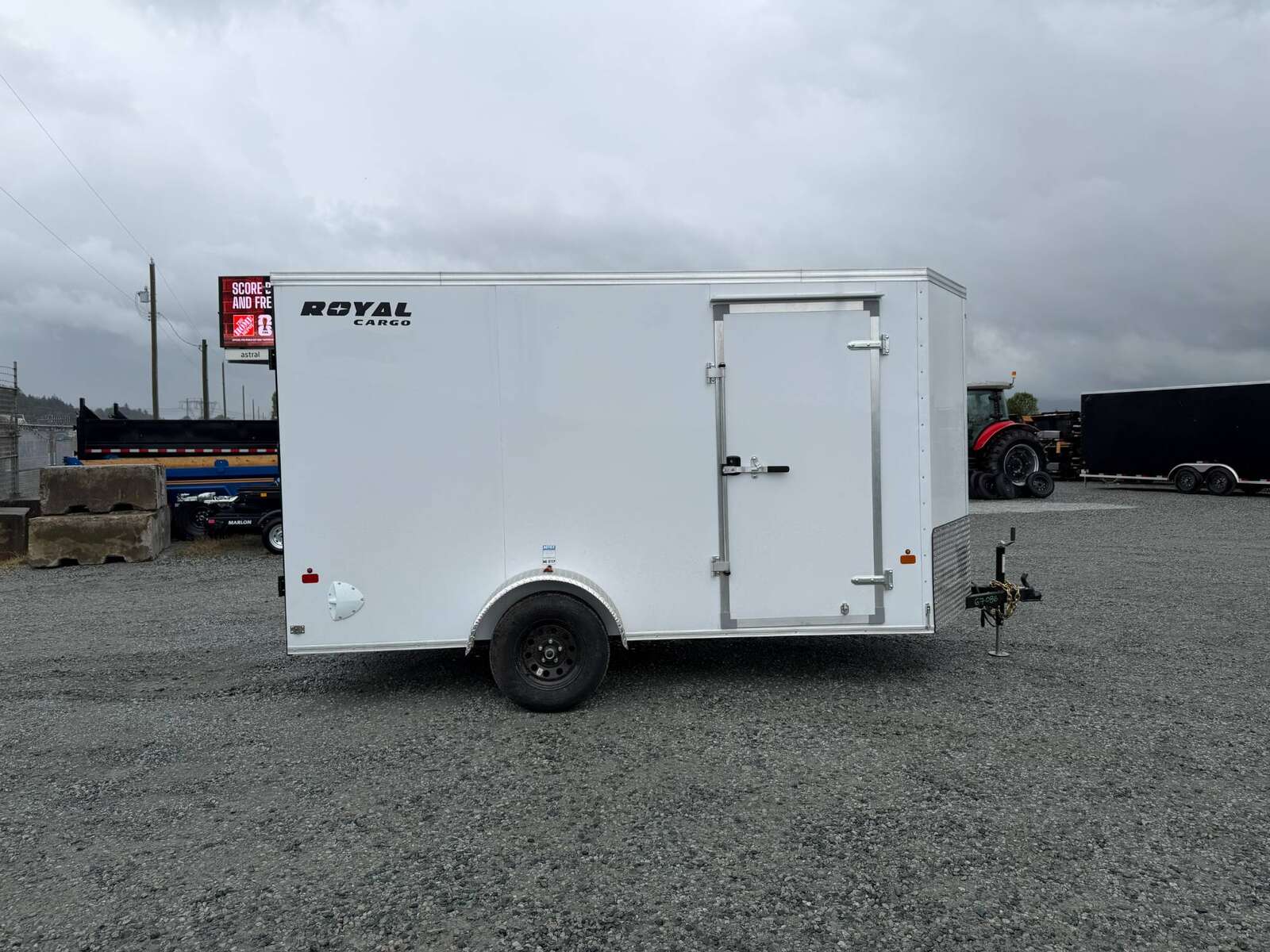 Photo of 2026 Royal Cargo 6x12 V Nose Cargo / Enclosed Trailer Barn Doors White Extra height 2900lb GVW