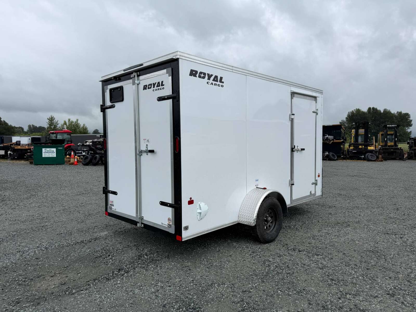 Photo of 2026 Royal Cargo 6x12 V Nose Cargo / Enclosed Trailer Barn Doors White Extra height 2900lb GVW