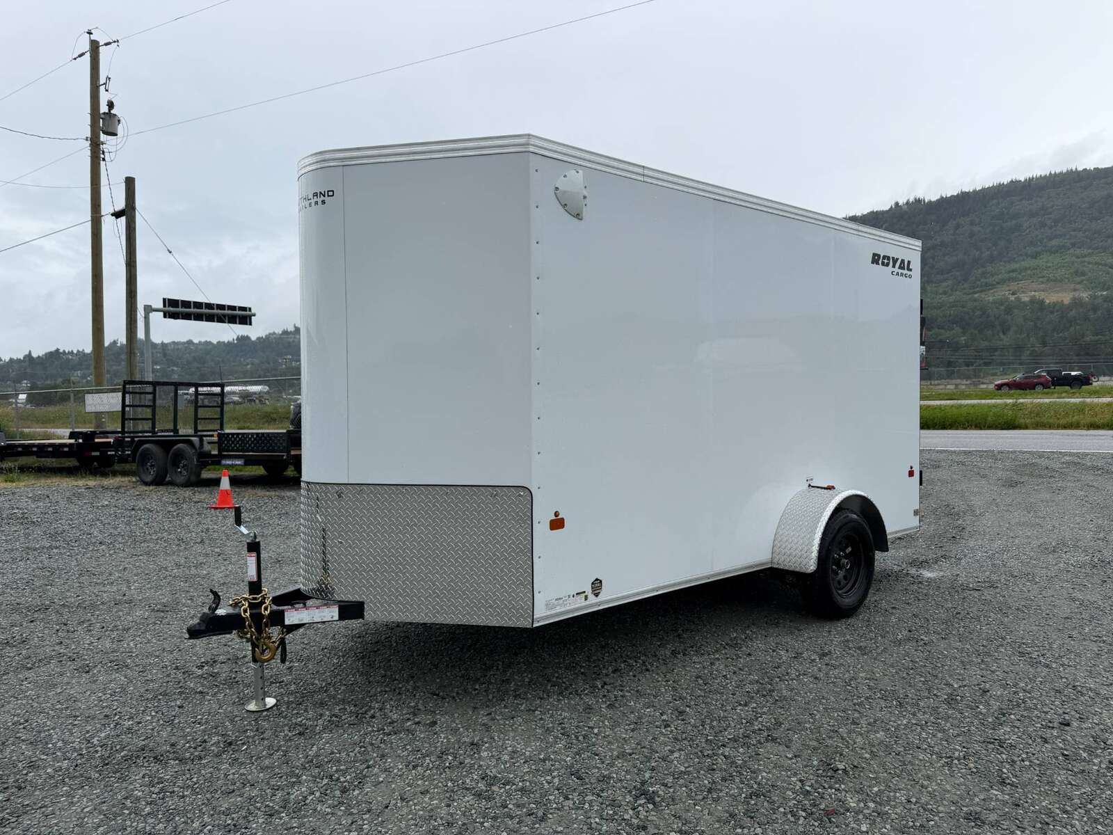 Photo of 2026 Royal Cargo 6x12 V Nose Cargo / Enclosed Trailer Barn Doors White Extra height 2900lb GVW