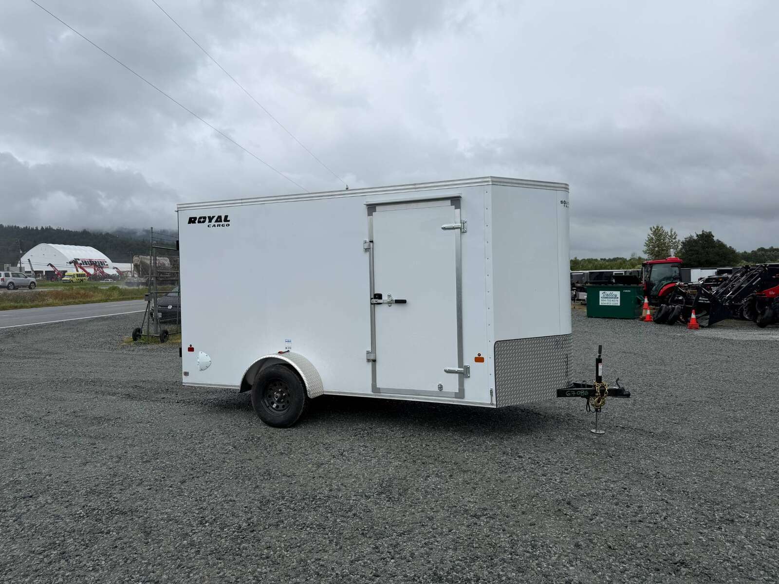 Photo of 2026 Royal Cargo 6x12 V Nose Cargo / Enclosed Trailer Barn Doors White Extra height 2900lb GVW