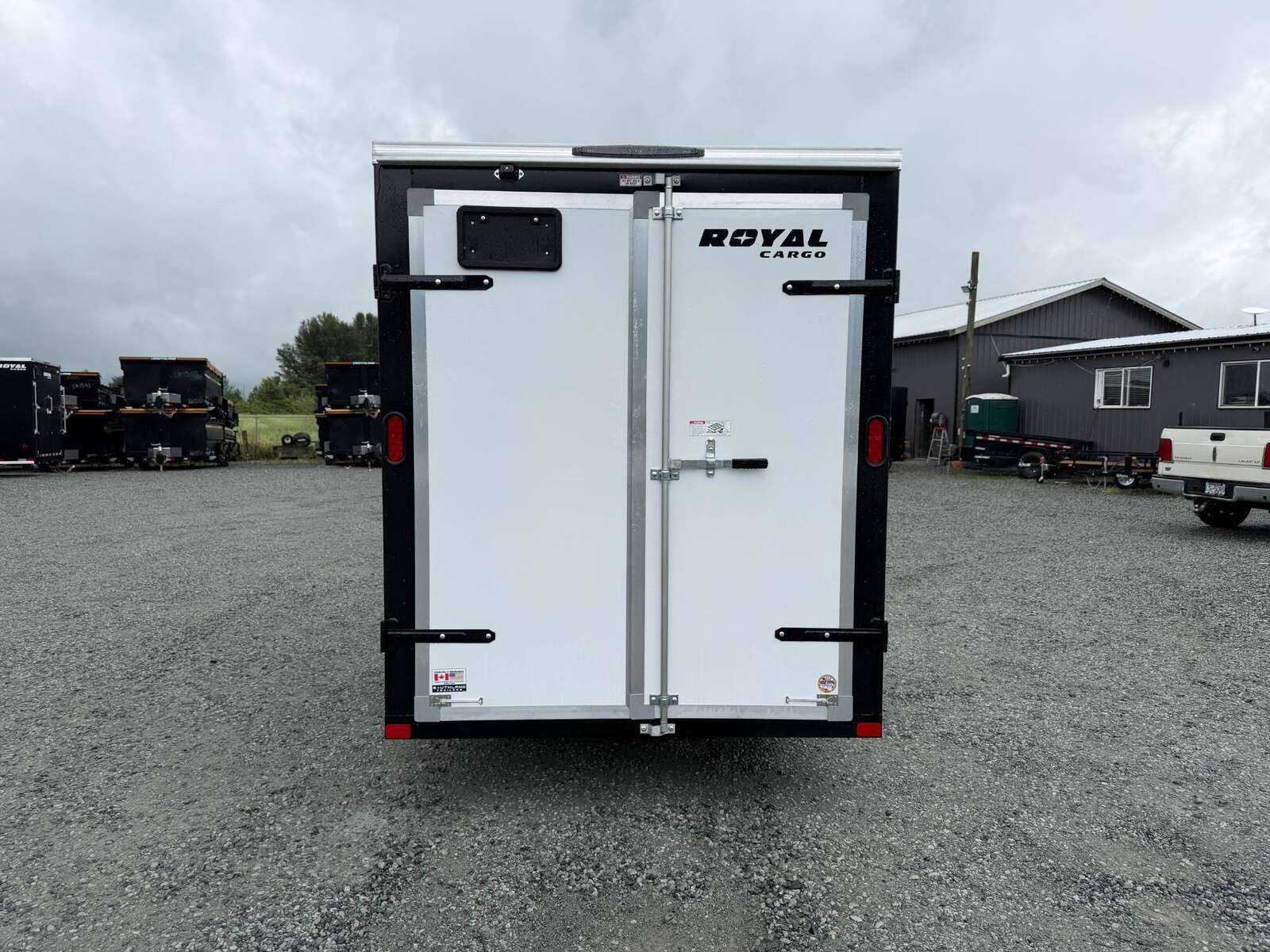 Photo of 2026 Royal Cargo 6x12 V Nose Cargo / Enclosed Trailer Barn Doors White Extra height 2900lb GVW