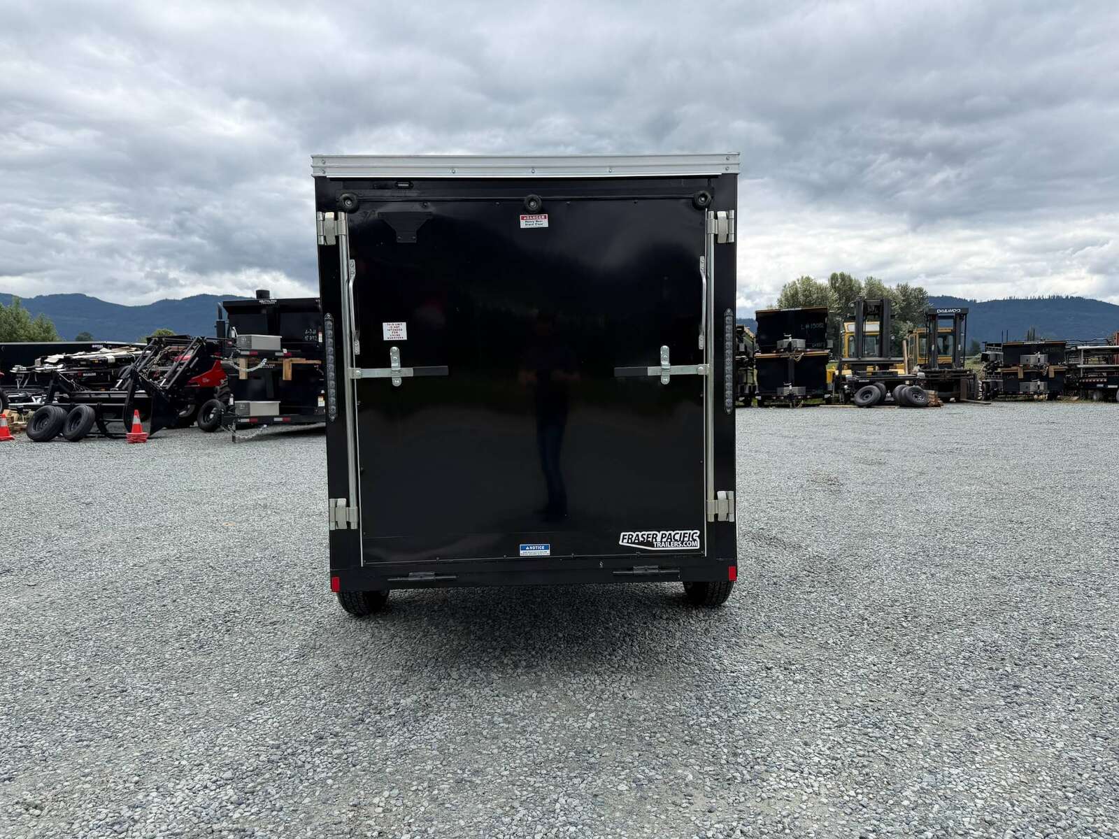Photo of Pre Owned Used 2023 TNT 5x10 Enclosed Cargo Trailer 2990lb GVW Black V Nose w/ Ramp Door