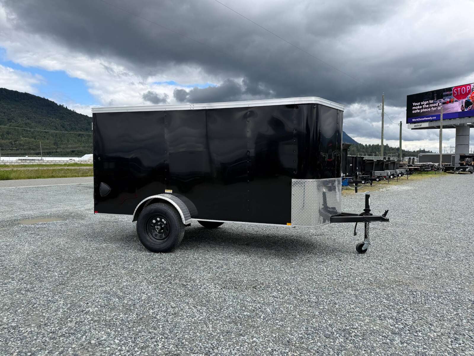 Photo of Pre Owned Used 2023 TNT 5x10 Enclosed Cargo Trailer 2990lb GVW Black V Nose w/ Ramp Door