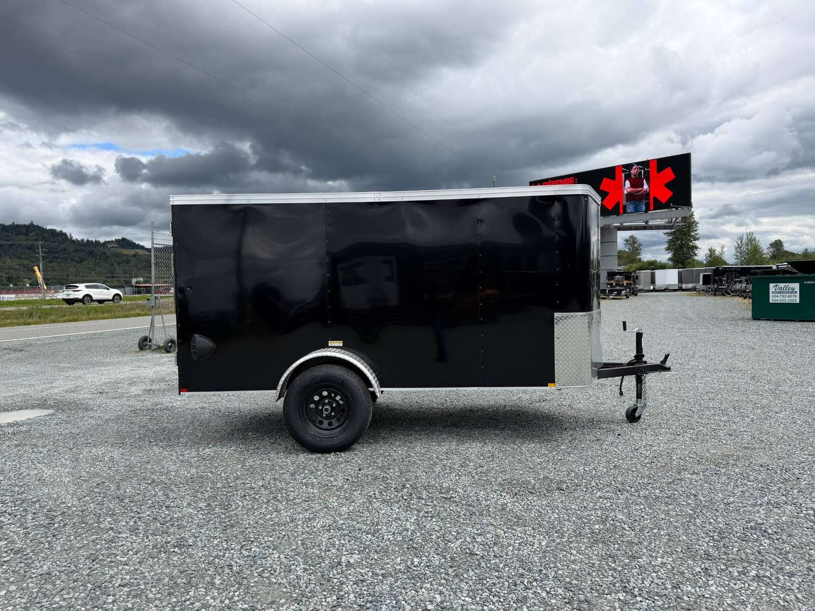 Photo of Pre Owned Used 2023 TNT 5x10 Enclosed Cargo Trailer 2990lb GVW Black V Nose w/ Ramp Door