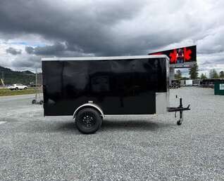 Thumbnail Photo of Pre Owned Used 2023 TNT 5x10 Enclosed Cargo Trailer 2990lb GVW Black V Nose w/ Ramp Door