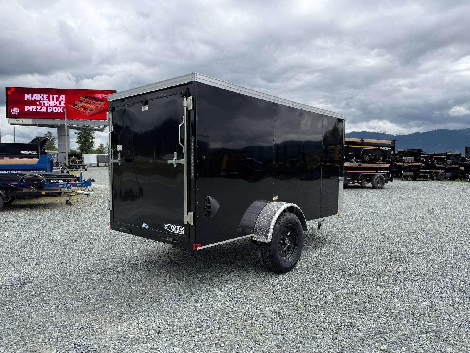 Photo of Pre Owned Used 2023 TNT 5x10 Enclosed Cargo Trailer 2990lb GVW Black V Nose w/ Ramp Door