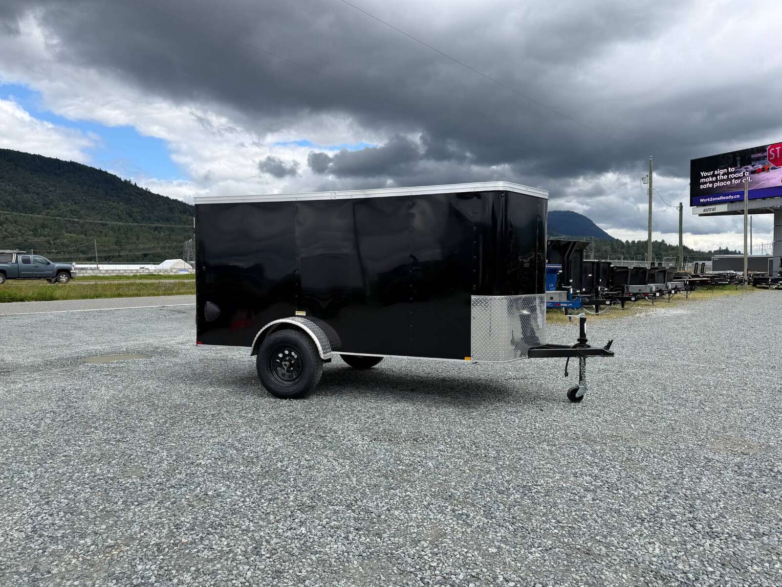 Photo of Pre Owned Used 2023 TNT 5x10 Enclosed Cargo Trailer 2990lb GVW Black V Nose w/ Ramp Door