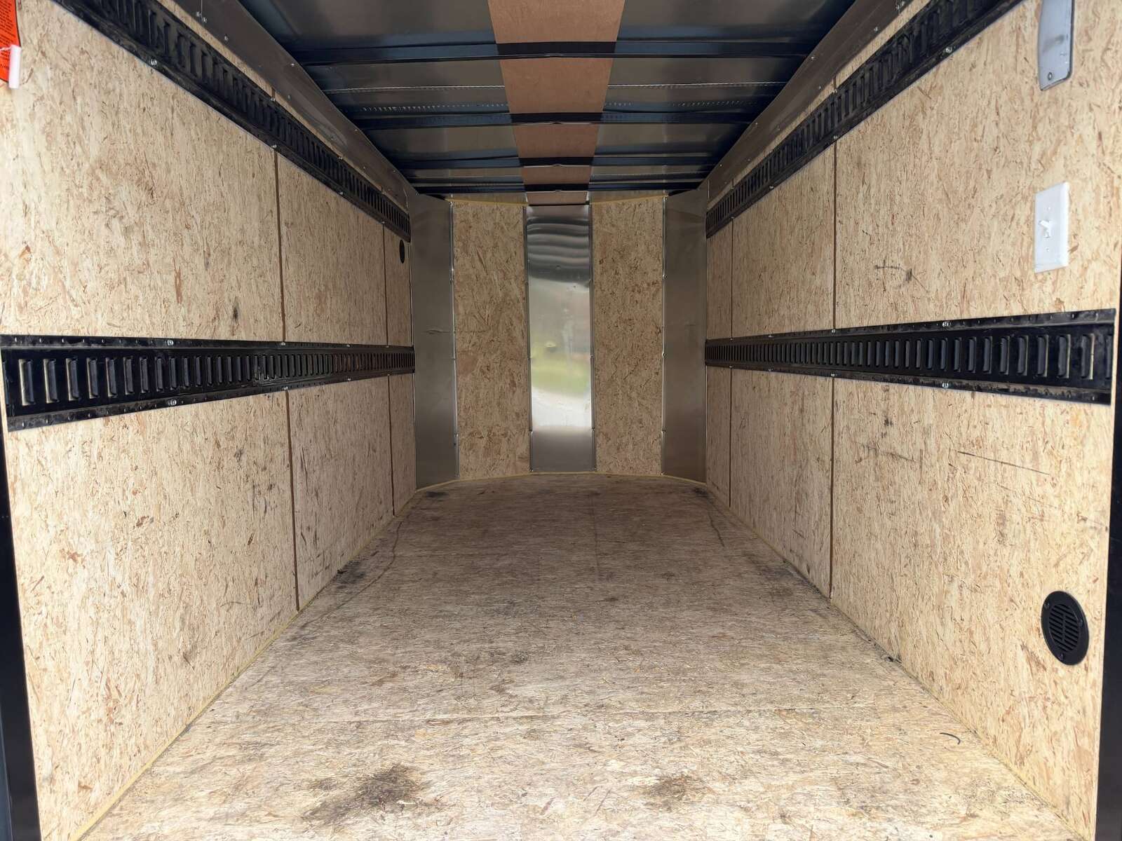 Photo of Pre Owned Used 2023 TNT 5x10 Enclosed Cargo Trailer 2990lb GVW Black V Nose w/ Ramp Door