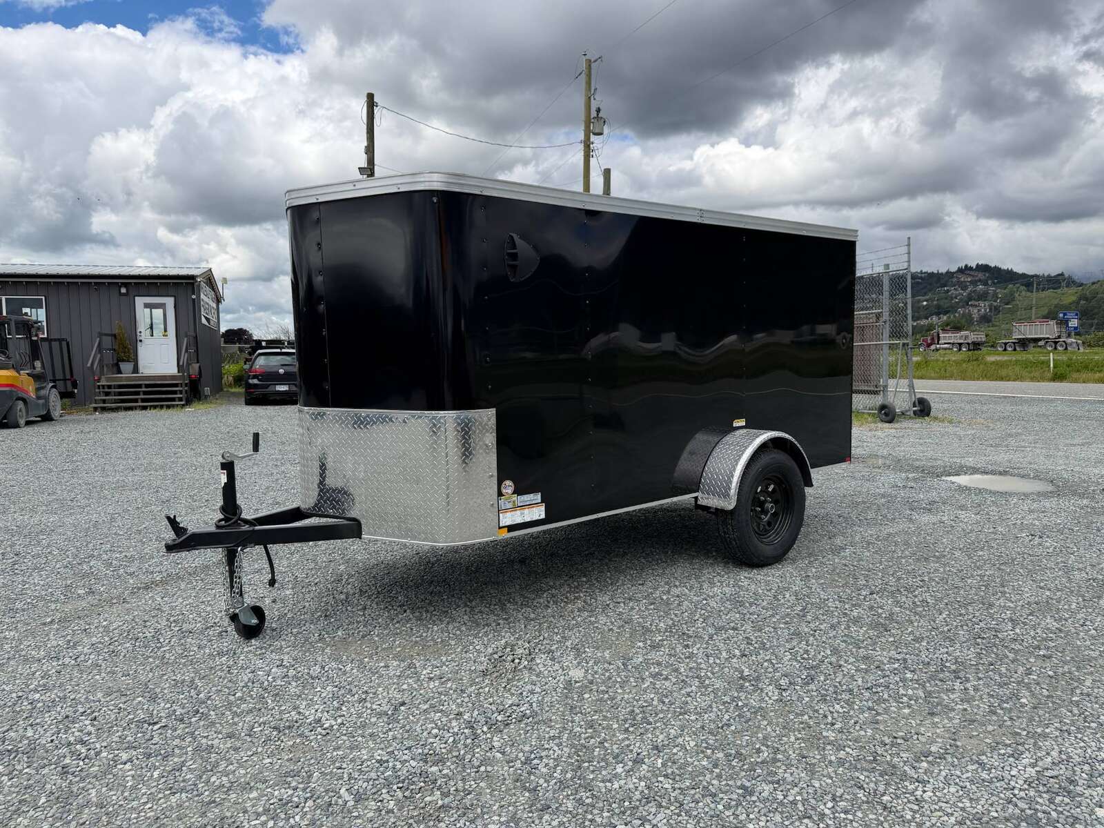 Photo of Pre Owned Used 2023 TNT 5x10 Enclosed Cargo Trailer 2990lb GVW Black V Nose w/ Ramp Door