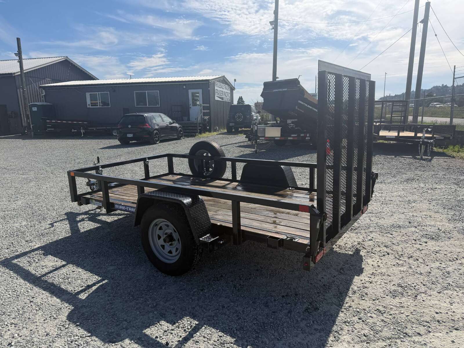 Photo of Used Pre Owned 2021 Suretrac 5X10 Utility Trailer 2990lb GVW with Ramp Gate