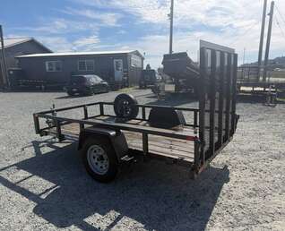 Thumbnail Photo of Used Pre Owned 2021 Suretrac 5X10 Utility Trailer 2990lb GVW with Ramp Gate