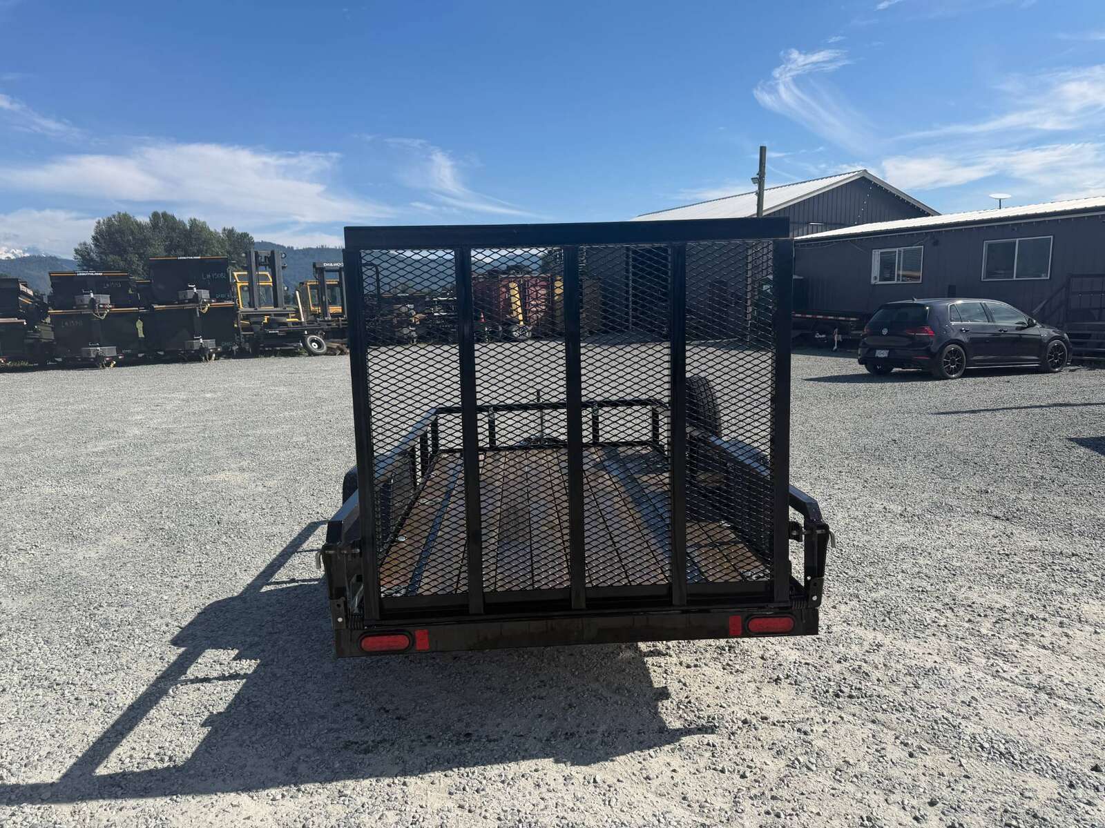 Photo of Used Pre Owned 2021 Suretrac 5X10 Utility Trailer 2990lb GVW with Ramp Gate