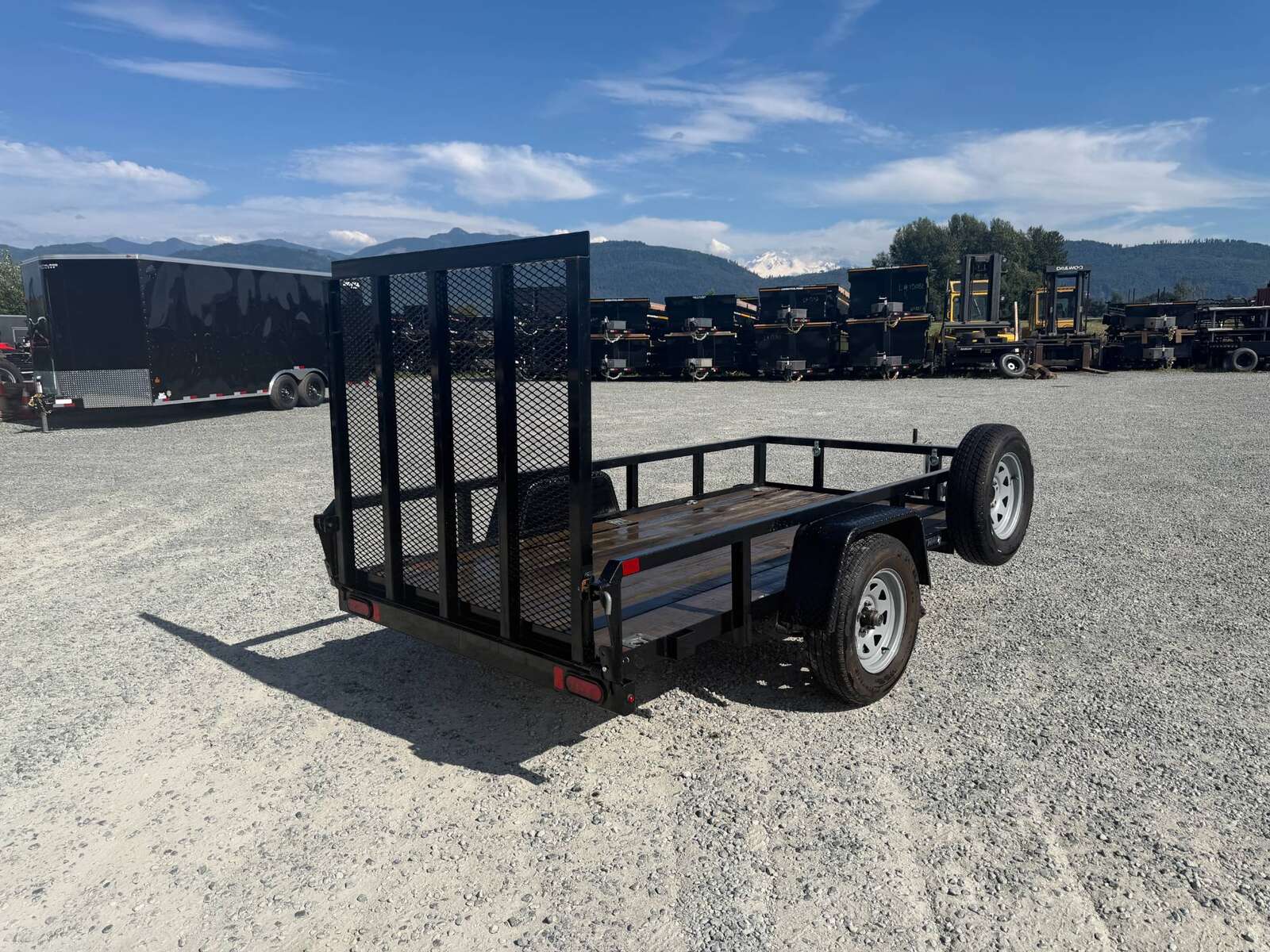 Photo of Used Pre Owned 2021 Suretrac 5X10 Utility Trailer 2990lb GVW with Ramp Gate