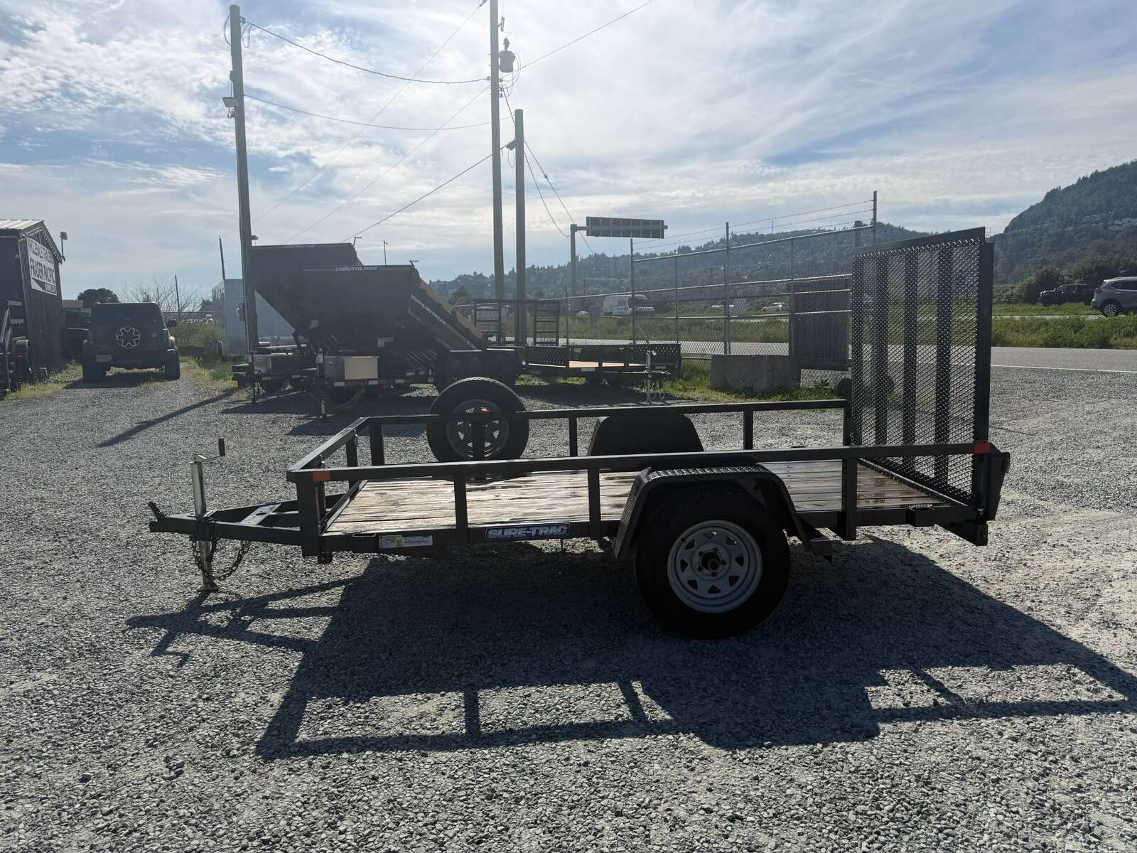 Photo of Used Pre Owned 2021 Suretrac 5X10 Utility Trailer 2990lb GVW with Ramp Gate
