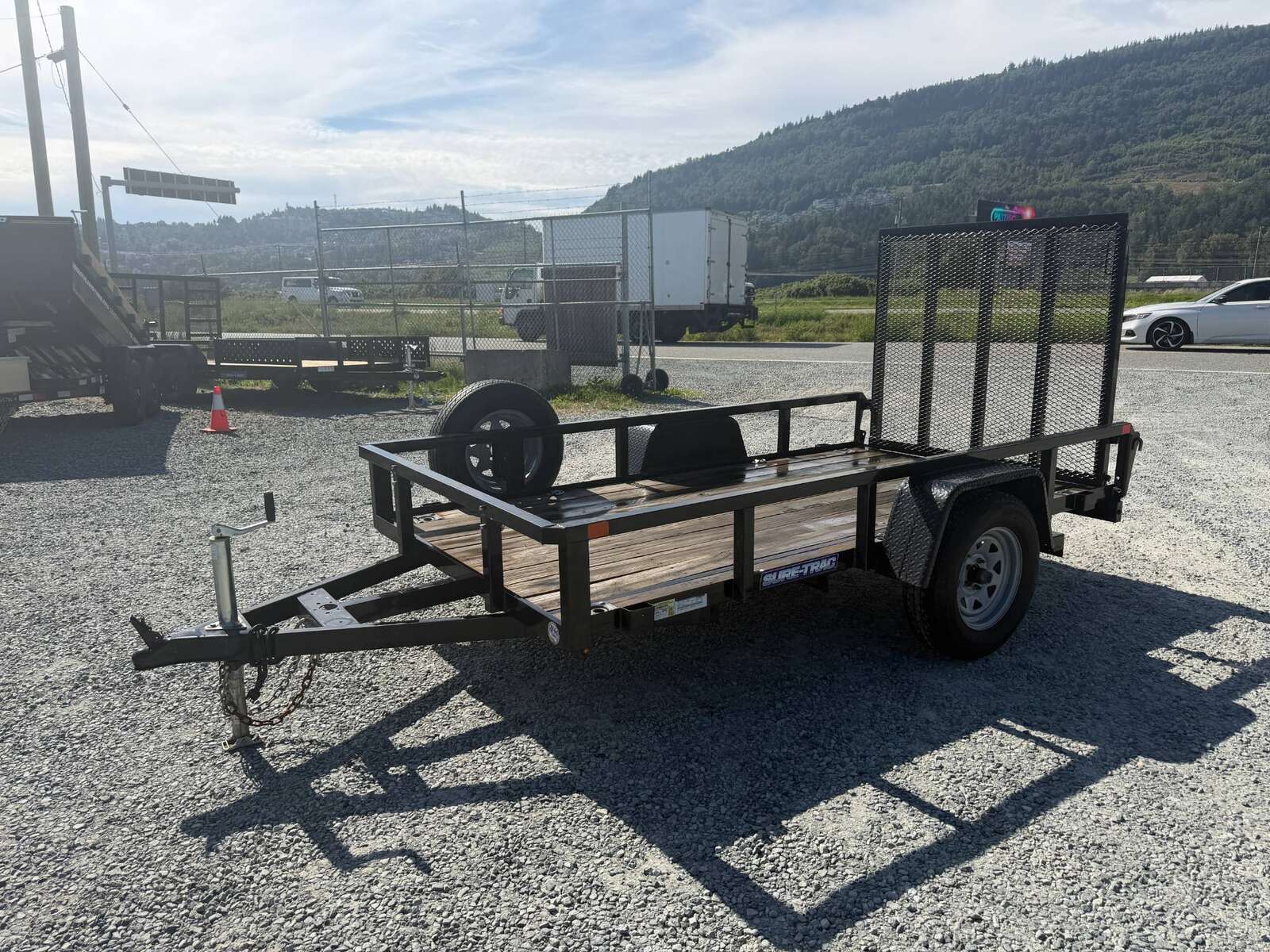 Photo of Used Pre Owned 2021 Suretrac 5X10 Utility Trailer 2990lb GVW with Ramp Gate