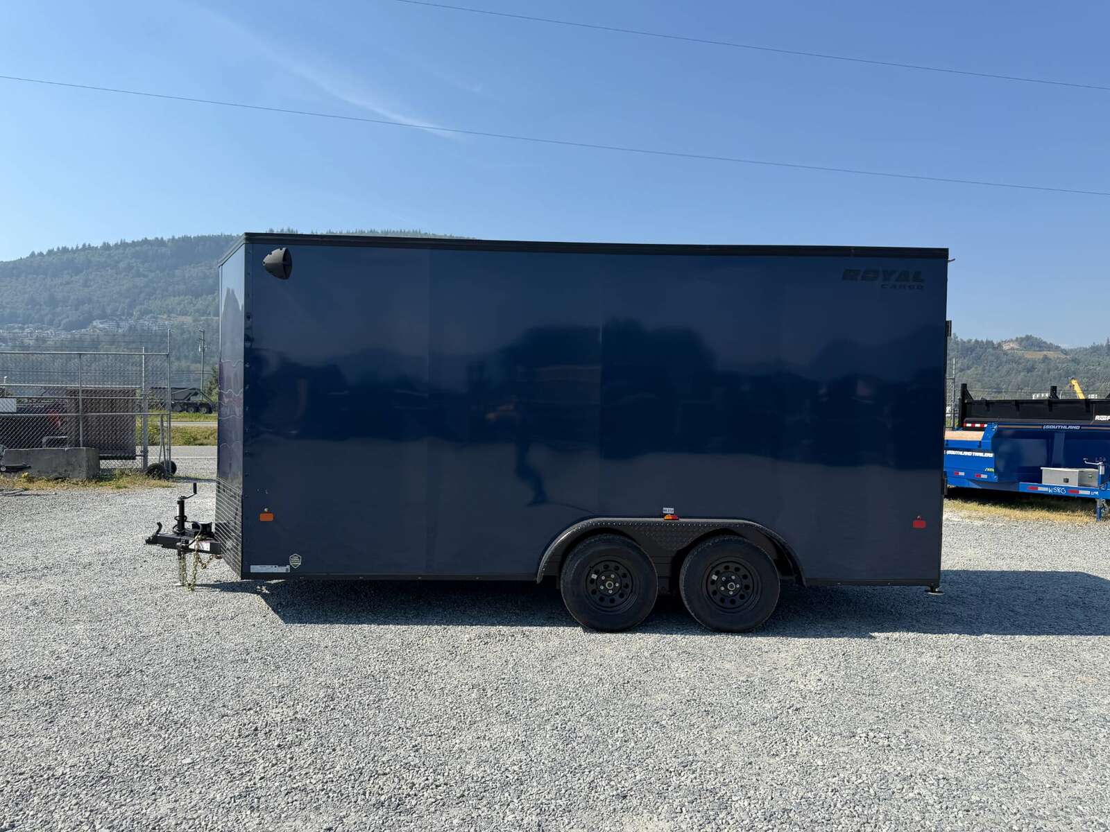 Photo of 2026 Royal 7.5X16 V-NOSE RAMP DOOR EXTRA HEIGHT Cargo / Enclosed Trailer Blue w/ Blackout Package 7700lb GVW (GSR)