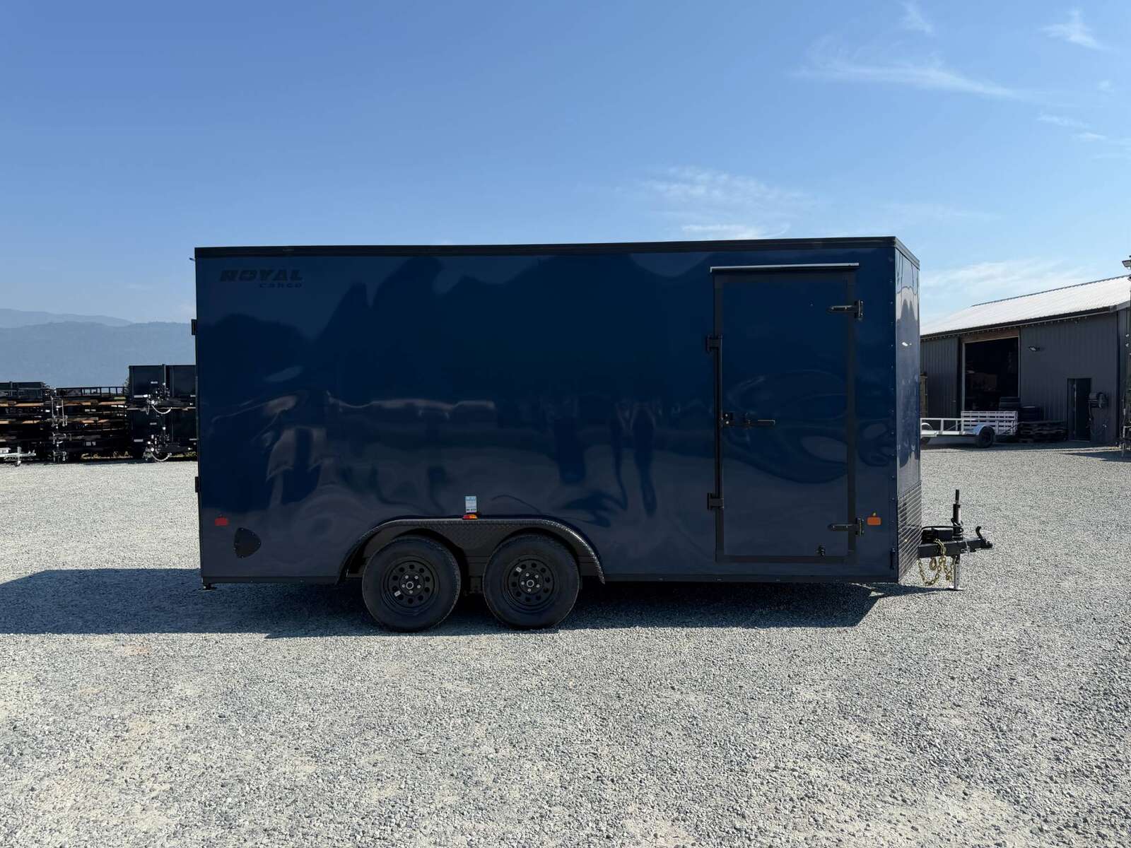 Photo of 2026 Royal 7.5X16 V-NOSE RAMP DOOR EXTRA HEIGHT Cargo / Enclosed Trailer Blue w/ Blackout Package 7700lb GVW (GSR)