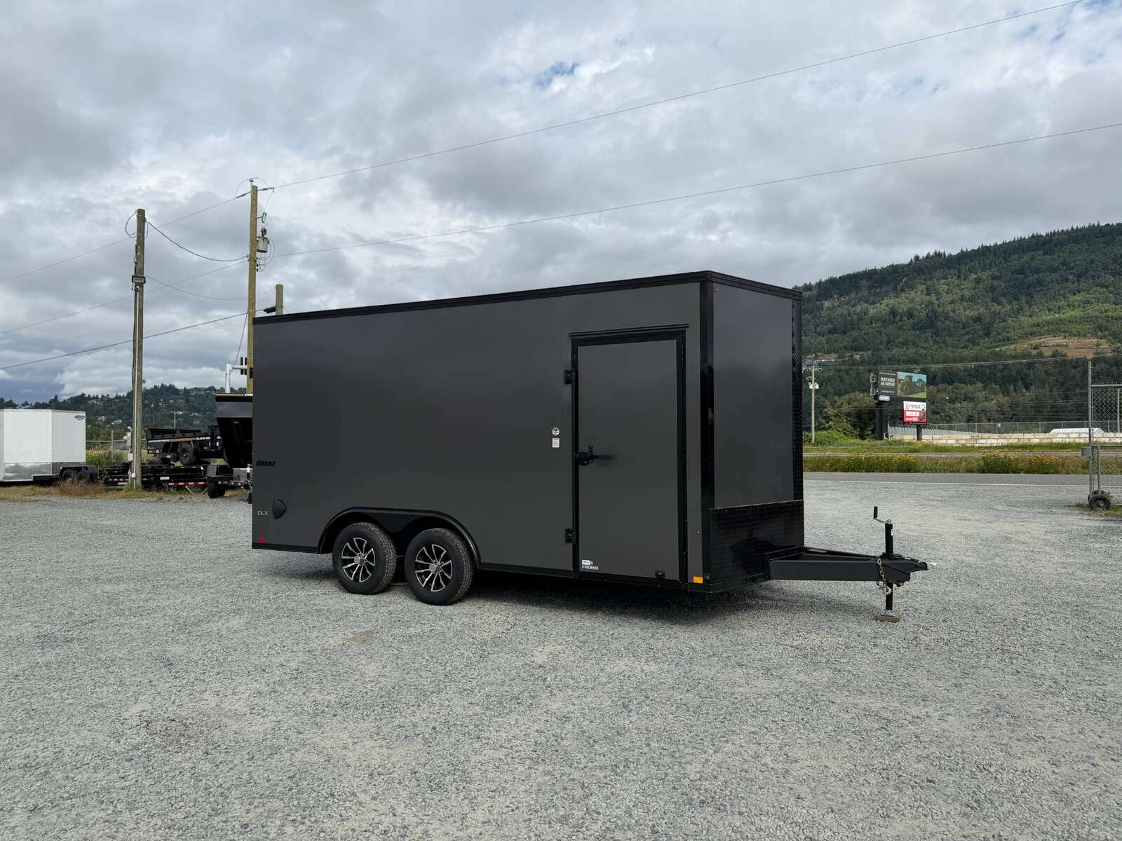 Photo of 2026 Impact 8.5x16 Quake V Nose Cargo / Enclosed Trailer Ramp Door Extra Height / Alu Wheels / Blackout Trim / Grey Polycor Exterior 7000lb GVW