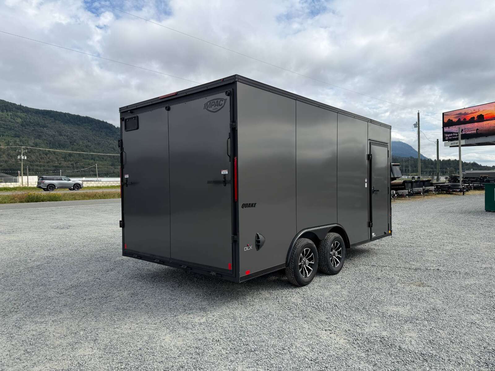 Photo of 2026 Impact 8.5x16 Quake V Nose Cargo / Enclosed Trailer Ramp Door Extra Height / Alu Wheels / Blackout Trim / Grey Polycor Exterior 7000lb GVW
