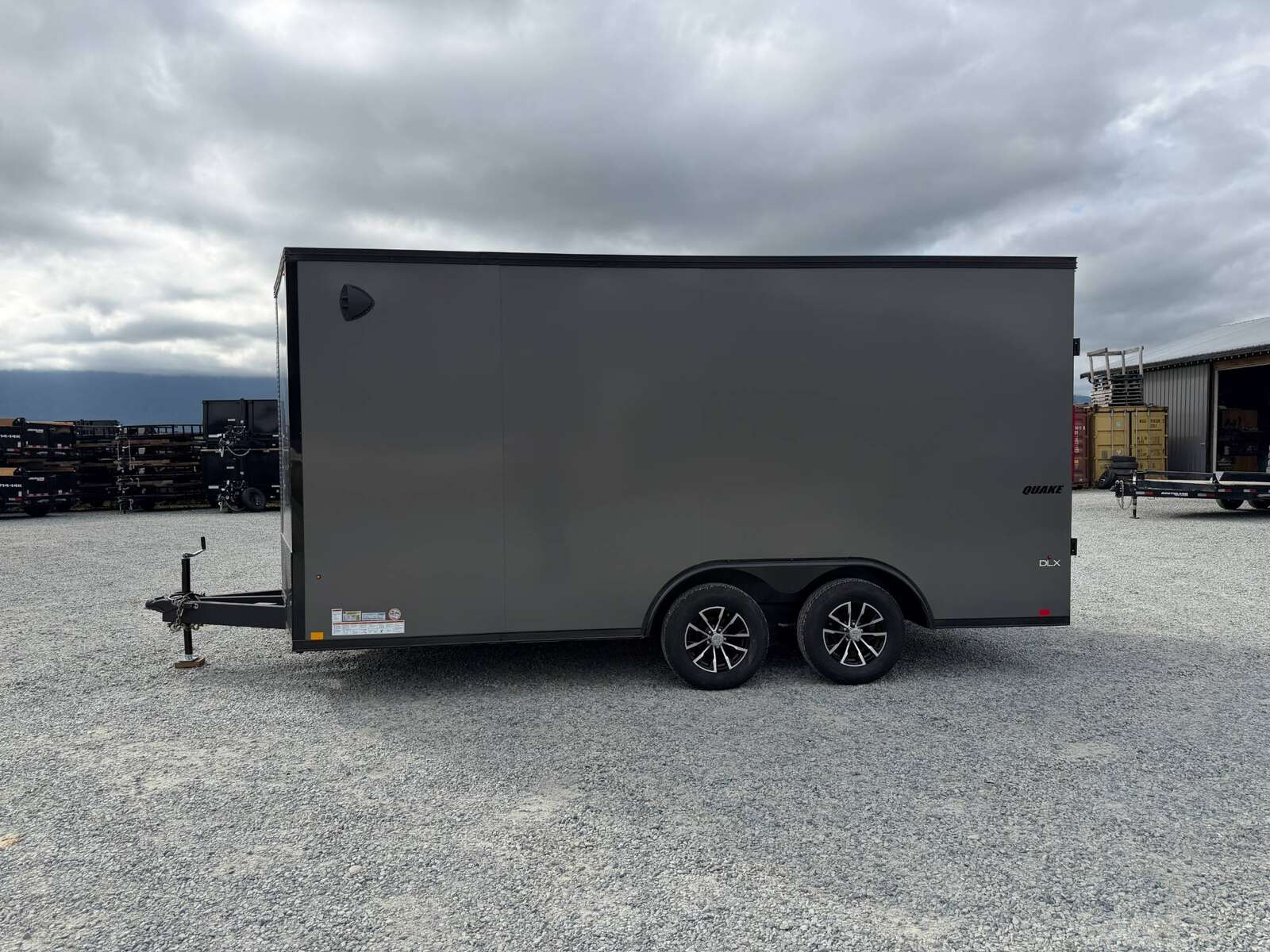 Photo of 2026 Impact 8.5x16 Quake V Nose Cargo / Enclosed Trailer Ramp Door Extra Height / Alu Wheels / Blackout Trim / Grey Polycor Exterior 7000lb GVW