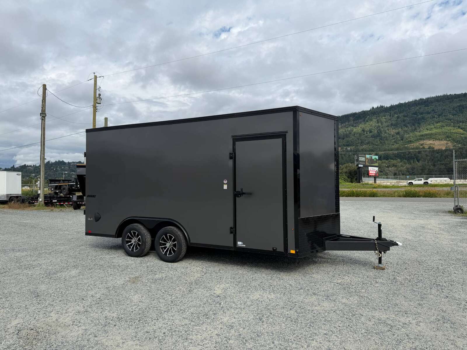 Photo of 2026 Impact 8.5x16 Quake V Nose Cargo / Enclosed Trailer Ramp Door Extra Height / Alu Wheels / Blackout Trim / Grey Polycor Exterior 7000lb GVW