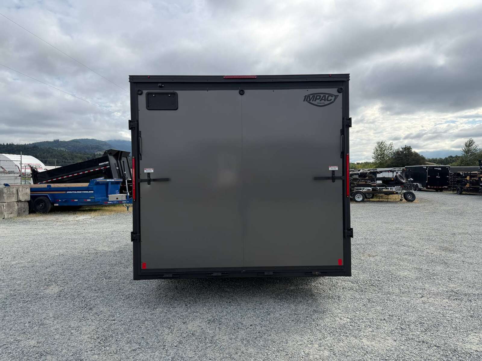 Photo of 2026 Impact 8.5x16 Quake V Nose Cargo / Enclosed Trailer Ramp Door Extra Height / Alu Wheels / Blackout Trim / Grey Polycor Exterior 7000lb GVW