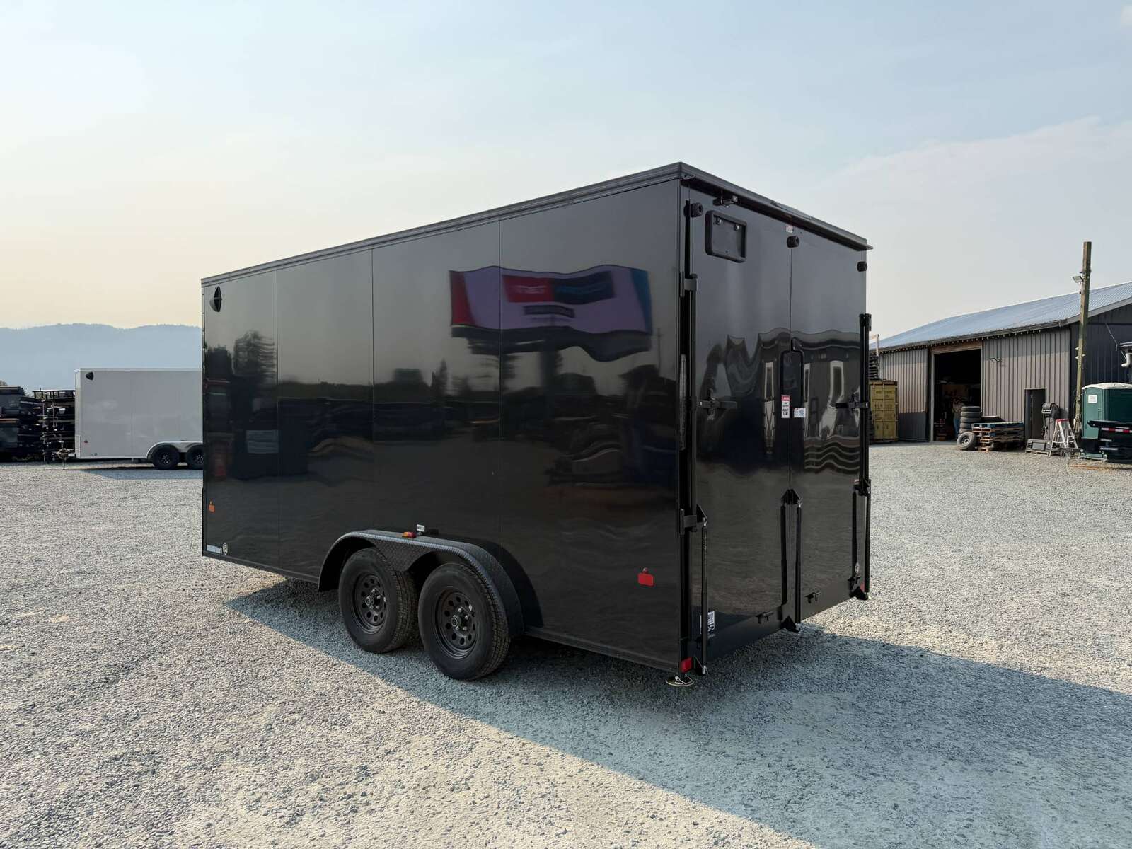 Photo of 2027 Royal 7.5X16 V-NOSE RAMP DOOR EXTRA HEIGHT Cargo / Enclosed Trailer GLOSS Black w/ Blackout Package 7700lb GVW (GSR)