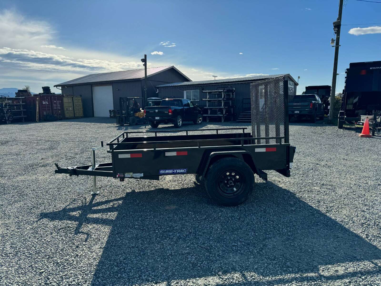 Photo of 2026 Suretrac 5X8 Utility Trailer Steel Side w/ Ramp Gate 2990LB GVW