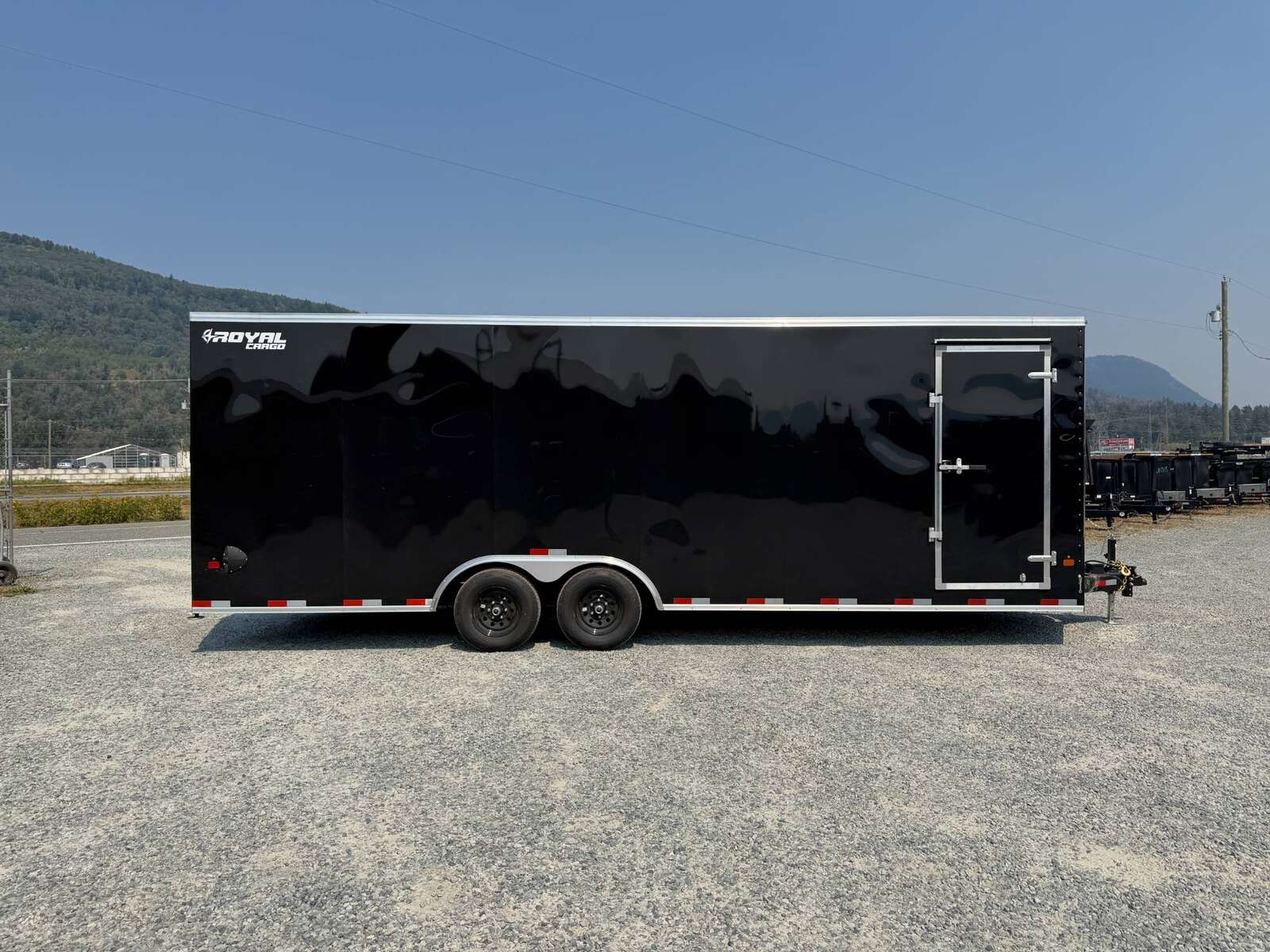 Photo of 2027 Royal Cargo 8.5x24 V Nose Car Hauler Cargo / Enclosed Trailer 11,400lb GVW GLOSS Black Ramp Door Extra Height (GSR)
