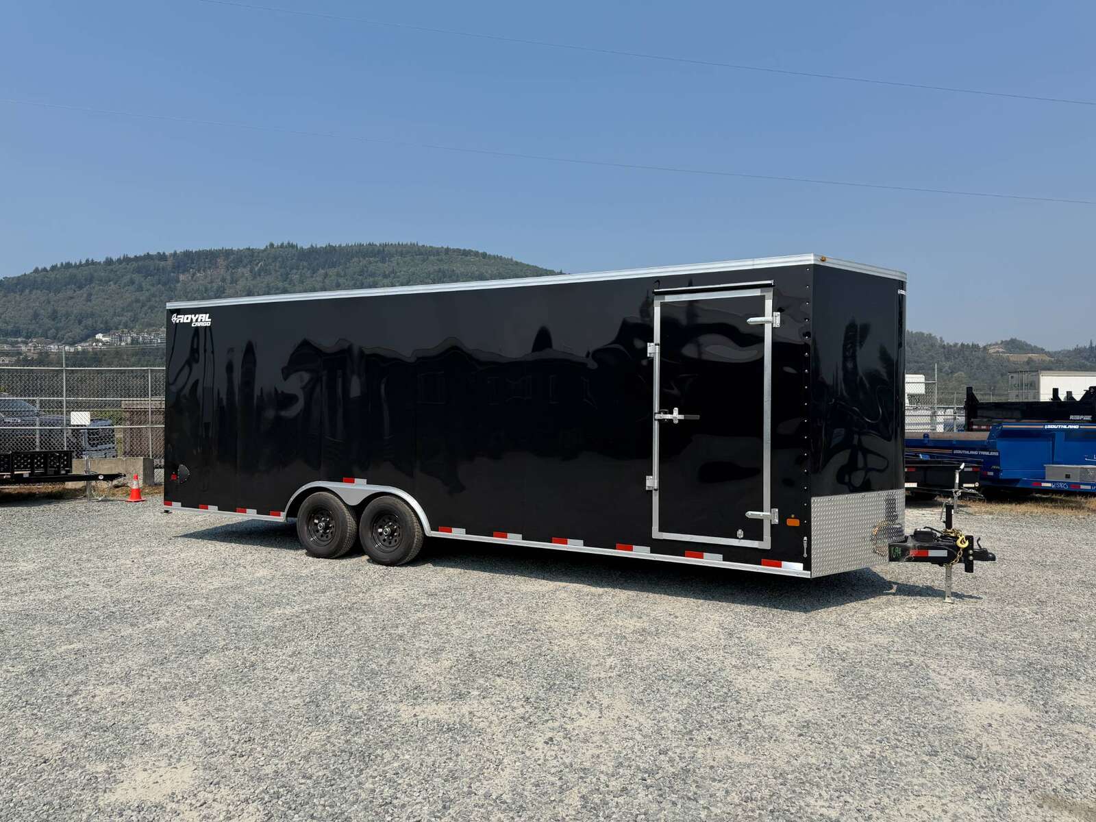 Photo of 2027 Royal Cargo 8.5x24 V Nose Car Hauler Cargo / Enclosed Trailer 11,400lb GVW GLOSS Black Ramp Door Extra Height (GSR)