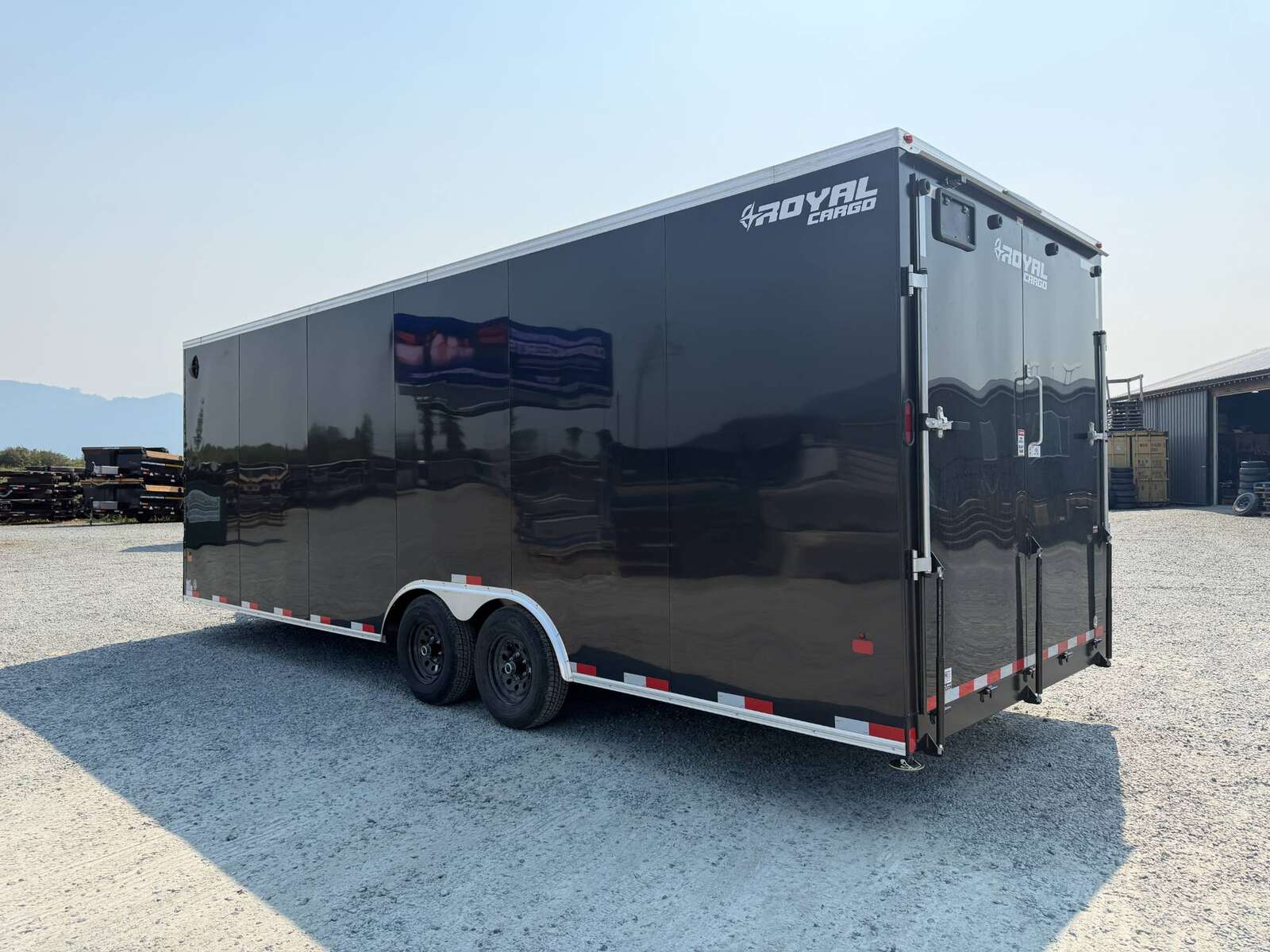 Photo of 2027 Royal Cargo 8.5x24 V Nose Car Hauler Cargo / Enclosed Trailer 11,400lb GVW GLOSS Black Ramp Door Extra Height (GSR)