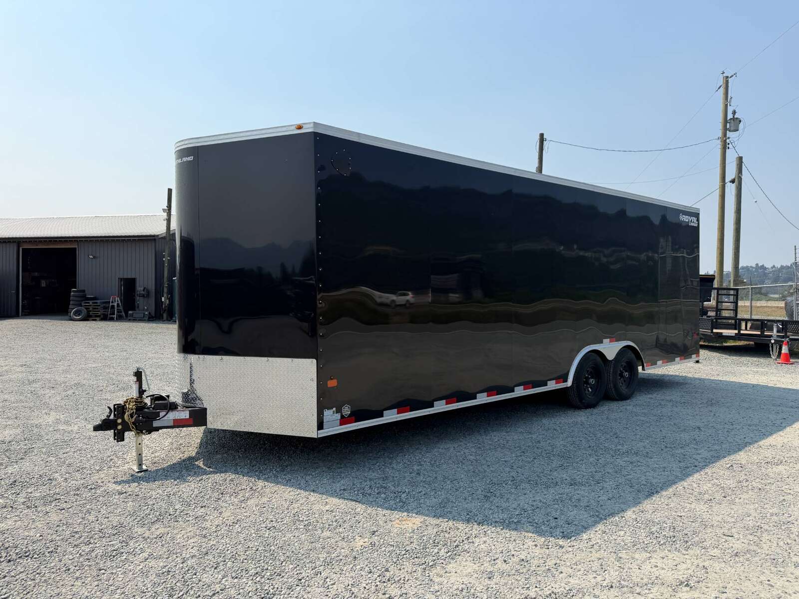 Photo of 2027 Royal Cargo 8.5x24 V Nose Car Hauler Cargo / Enclosed Trailer 11,400lb GVW GLOSS Black Ramp Door Extra Height (GSR)