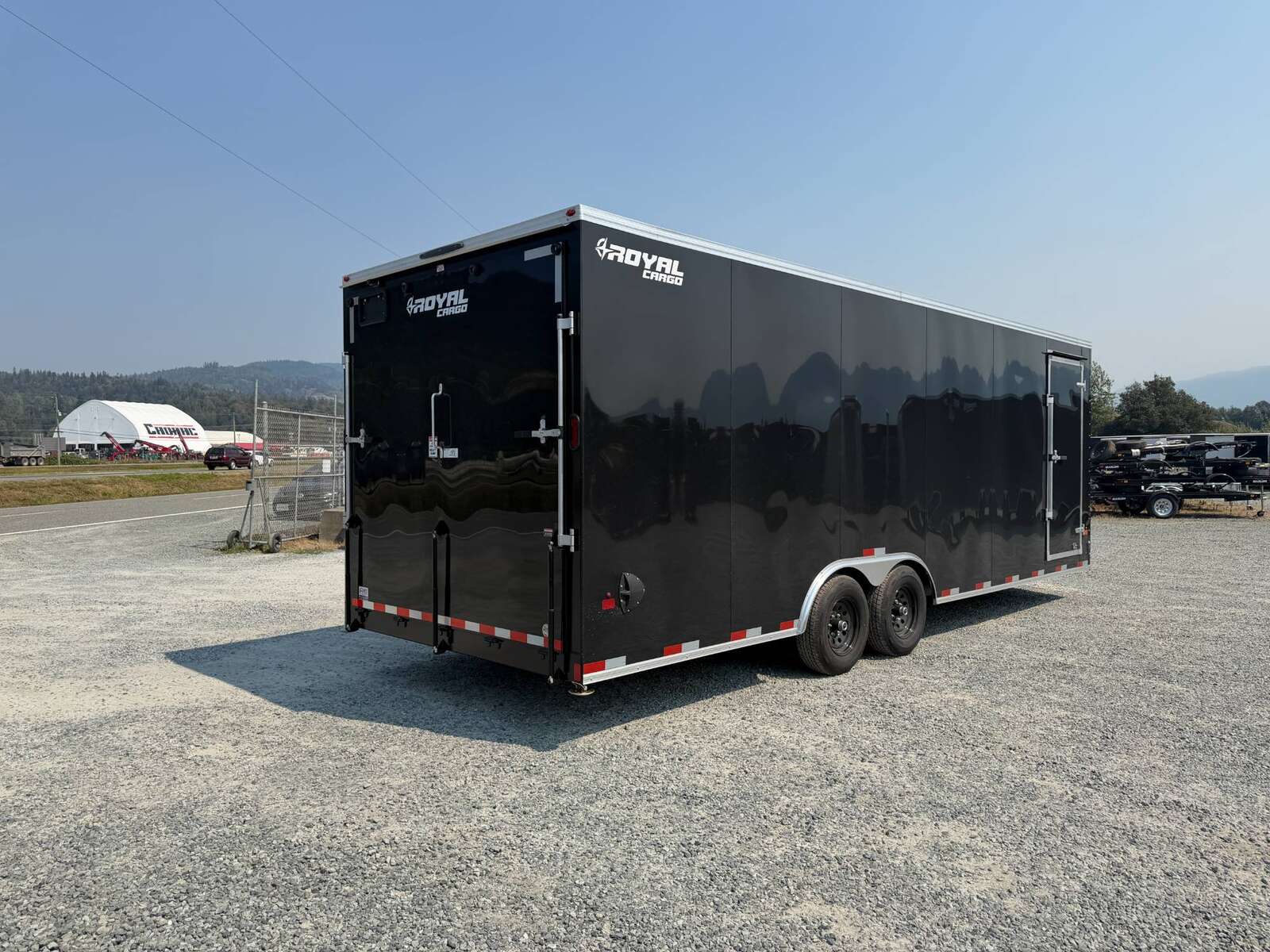 Photo of 2027 Royal Cargo 8.5x24 V Nose Car Hauler Cargo / Enclosed Trailer 11,400lb GVW GLOSS Black Ramp Door Extra Height (GSR)